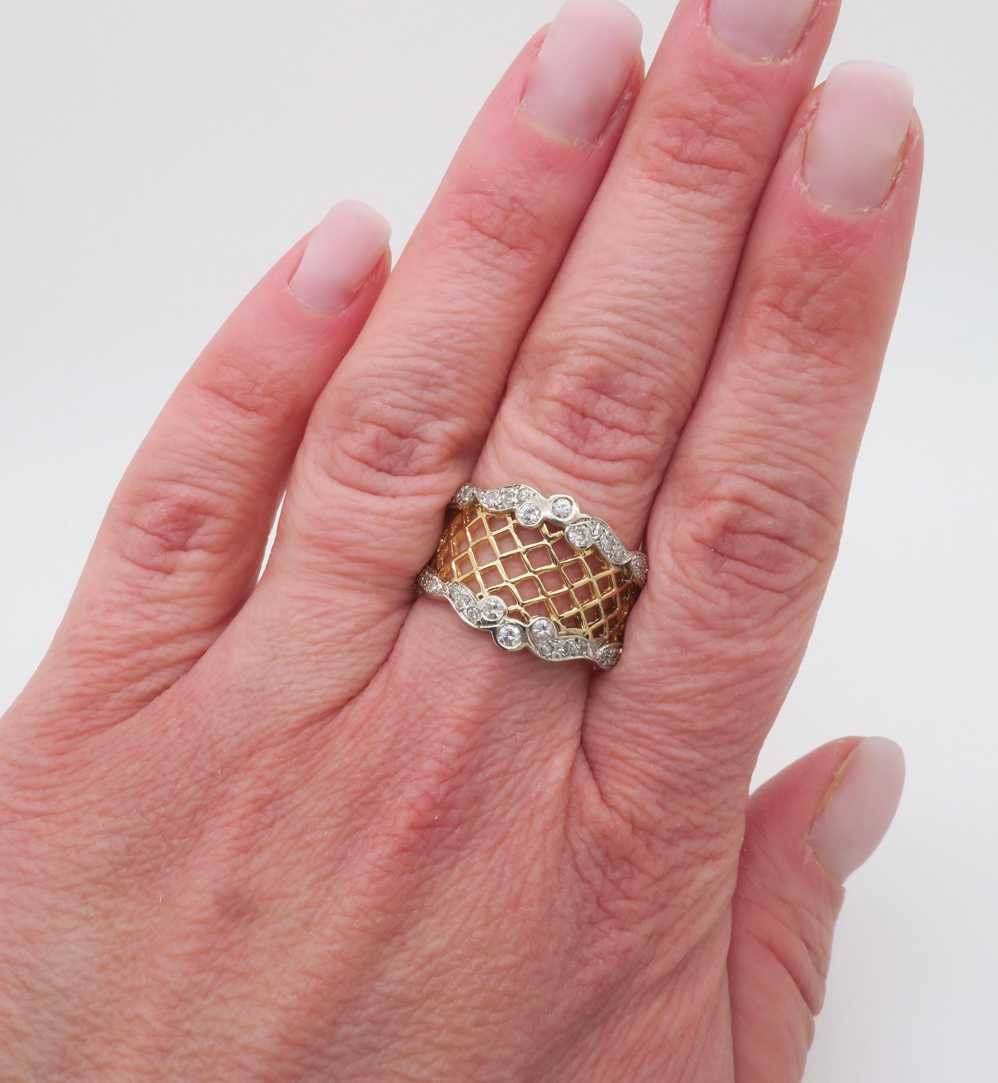 Beautiful vintage open cigar band with diamonds. 

Diamond Carat Weight: .75ctw
Diamond Cut: Round Brilliant & Round cut 
Color: F-H
Clarity: VS1-SI2
Metal: 14k Yellow Gold 
Stamped: 