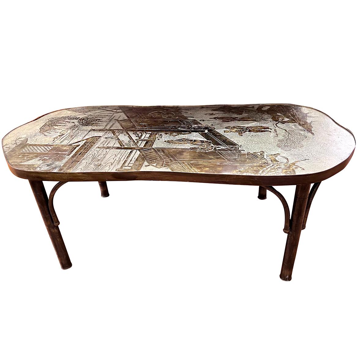 A circa 1960's patinated bronze and silvered table with original patina.

Measurements:
Height: 17