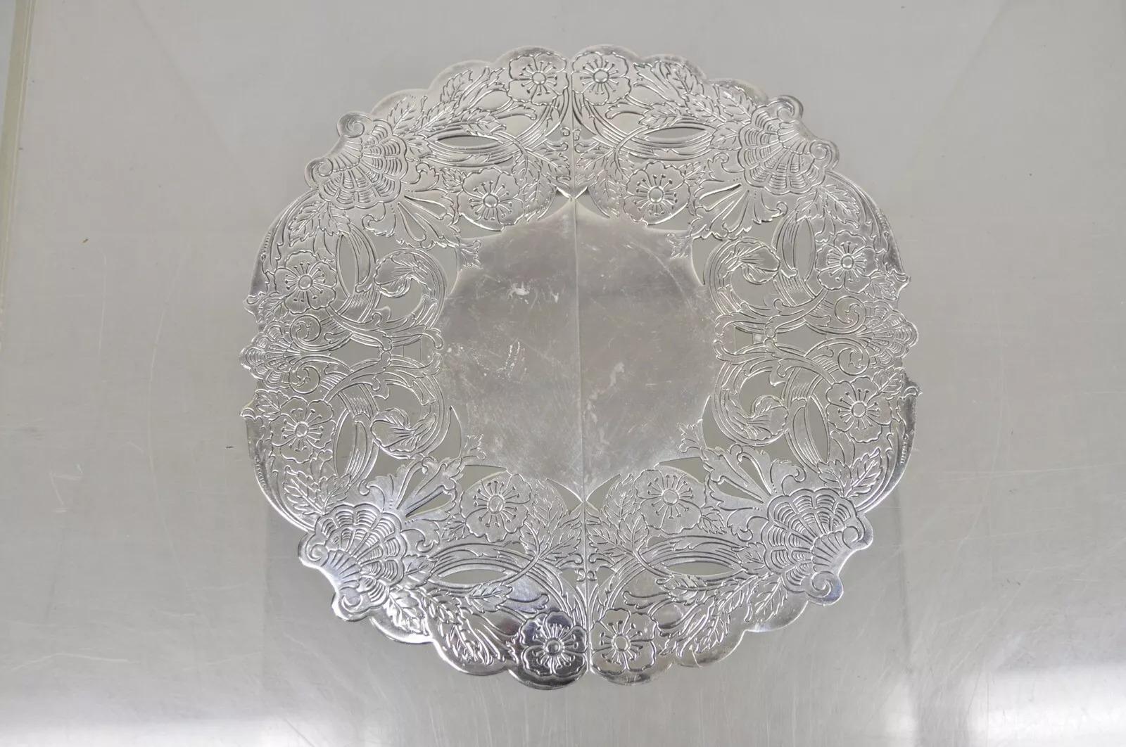 Vintage LBS Co Victorian Style Silver Plated Round Expandable Trivet. Circa Mid 20th Century. Measurements: 0.5