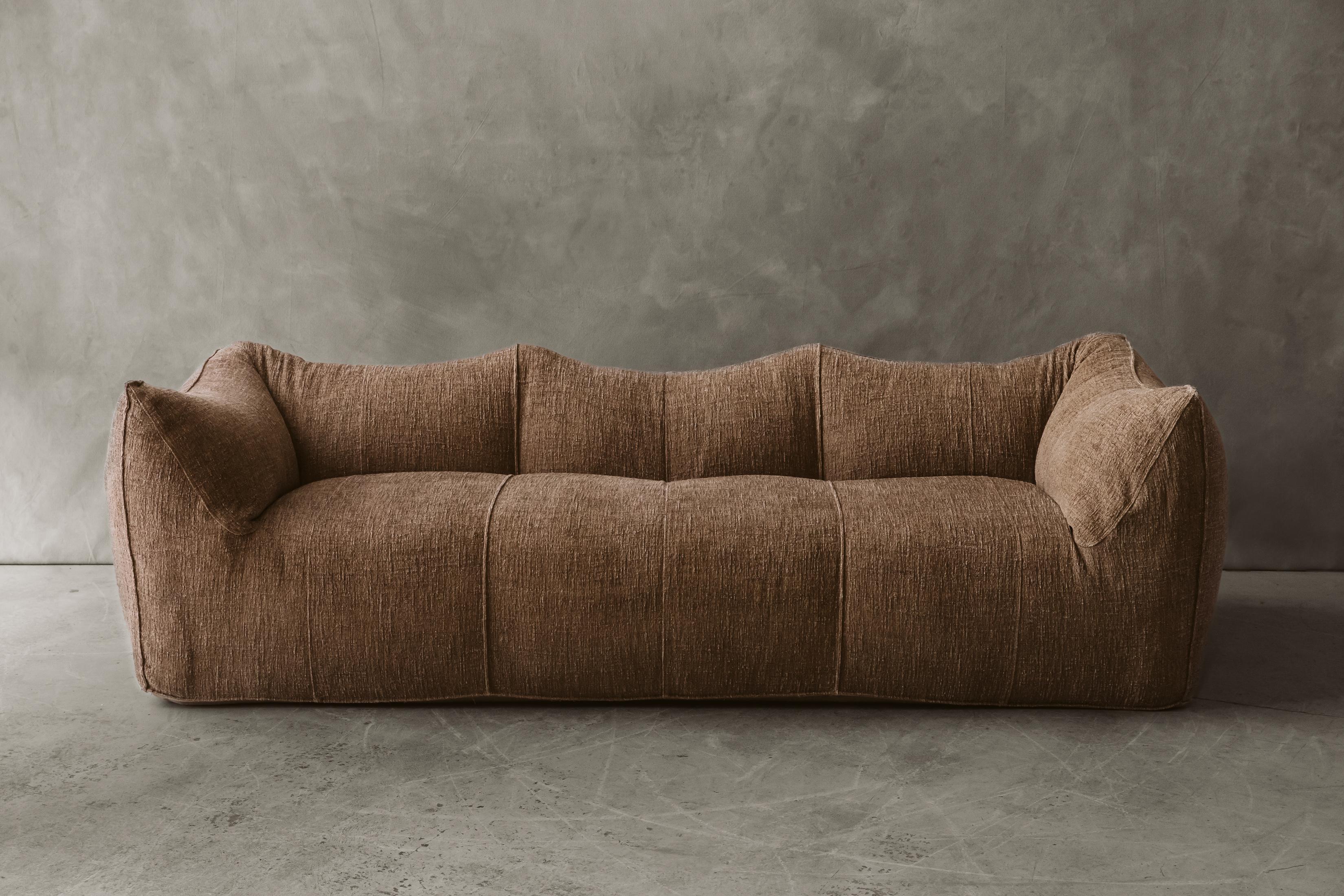 Le Bambole 3-Seater Leather Sofa by Mario Bellini for B&B Italia, 1970s.  Later upholstered in light brown upholstery and in excellent condition.  

We don't have the time to write an extensive description on each of our pieces. We prefer to speak
