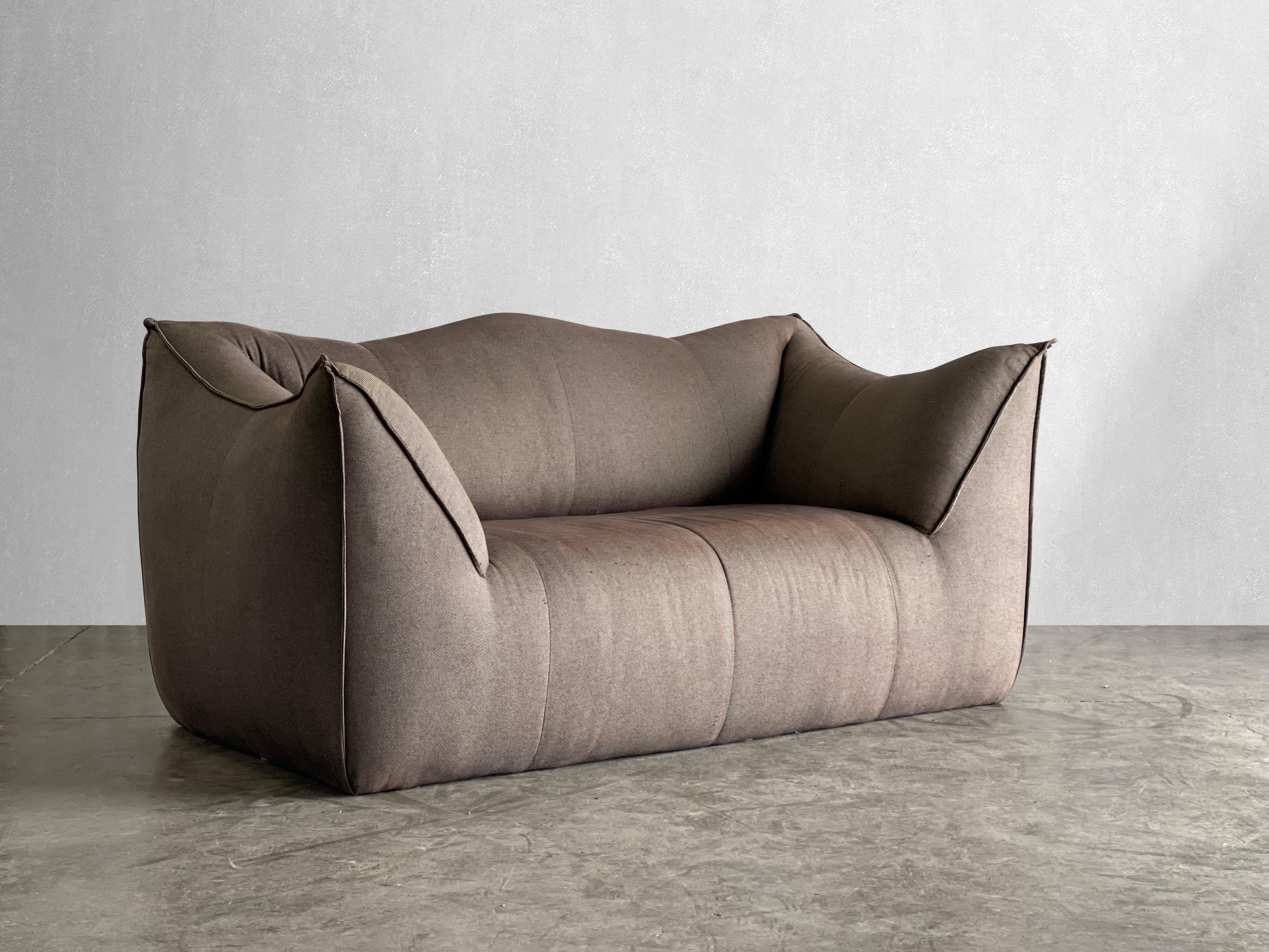 Vintage Le Bambole sofa Designed by Mario Bellini.

Produced by B&B Italia, C. 1978. The body of the vintage Le Bambole is more sculptural than the new version. Desirable chunky shape. This is the real deal. 

Love the curvy arms and curves along