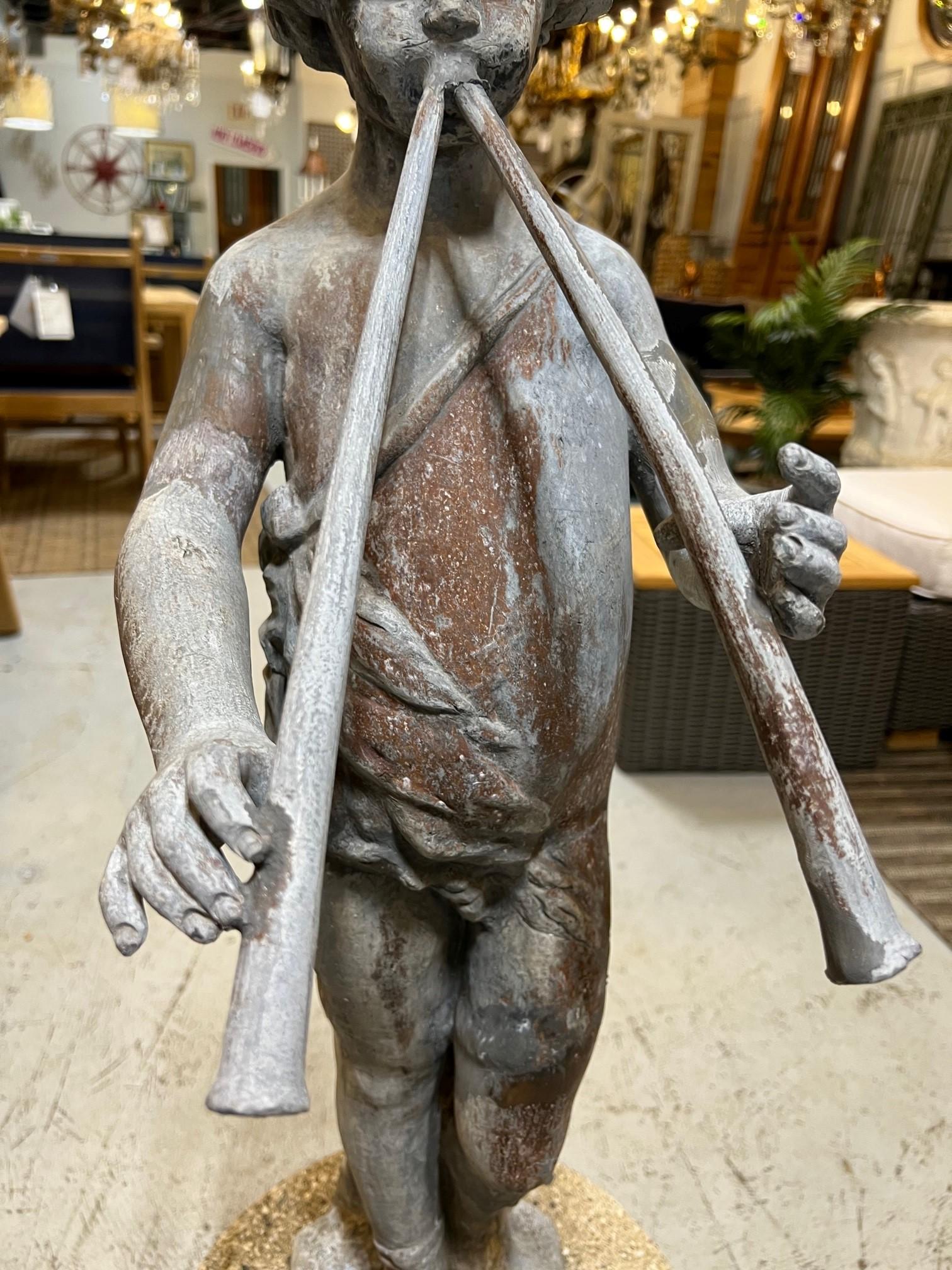 English Vintage Lead Figural Statue of Musical Pan with Flutes on a Stone Pedestal