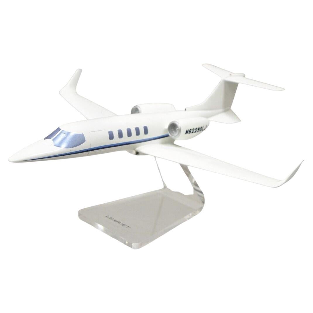 Vintage Learjet 16" Model Airplane Desk Plane Painted Metal on Acrylic Stand For Sale