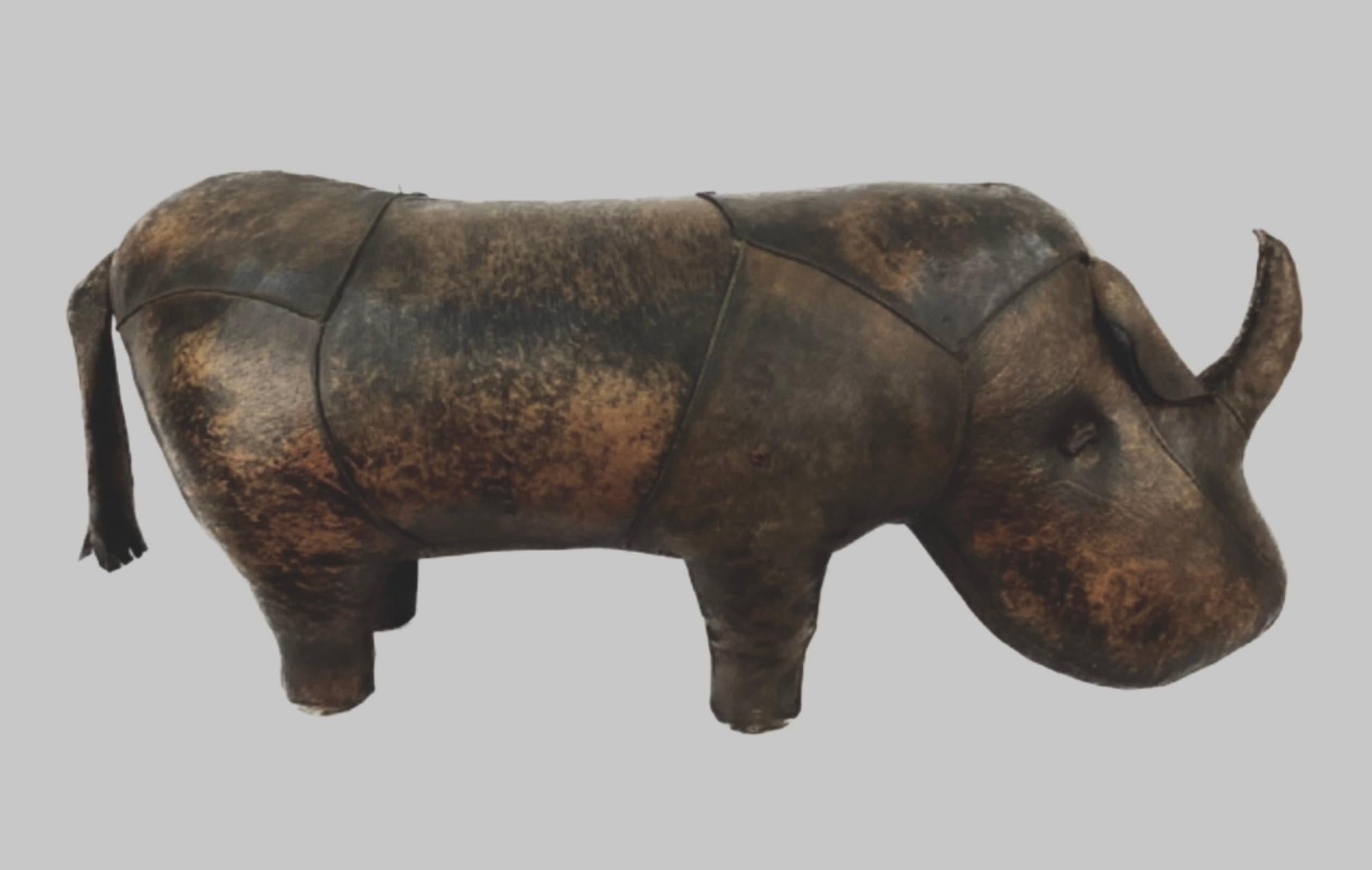 Vintage Omersa leather Rhinoceros for Abercrombie and Fitch. The medium size can be used as a footstool but was built  primarily as an ornament. Top grained unfinished cowhide leather which will have natural scuff marks. Hand-stitched along
