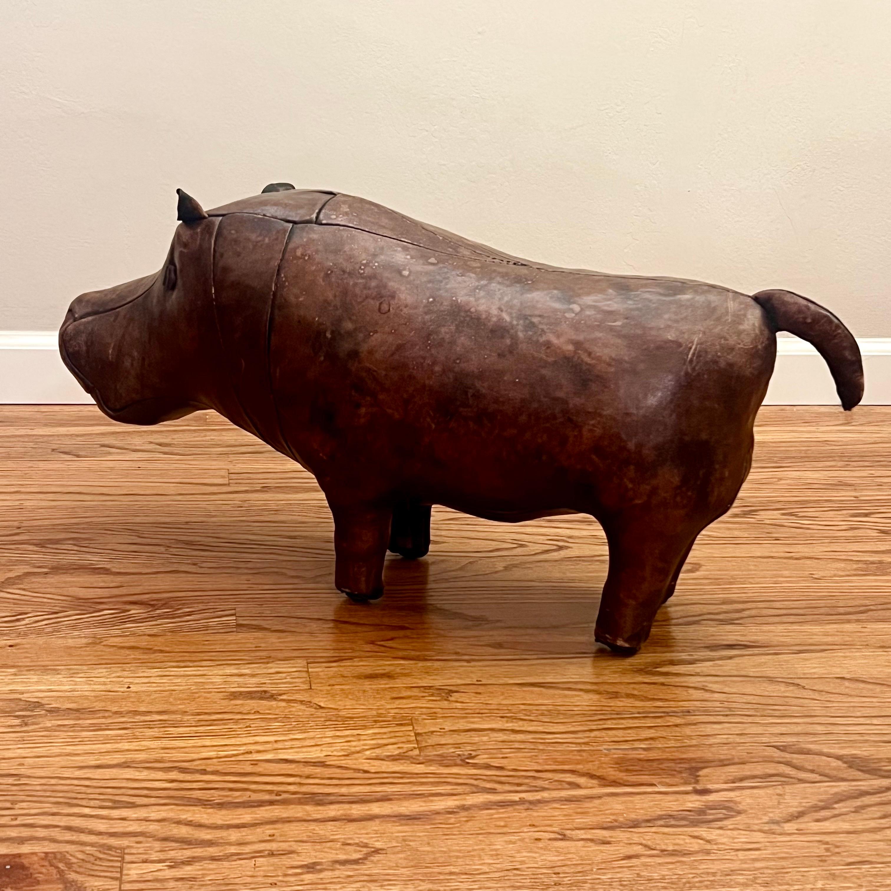 Fantastic early hippo footstool with beautiful leather patina by Omersa for Abercrombie and Fitch. No repairs have been done. Single owner who lived between Kyoto and New York.