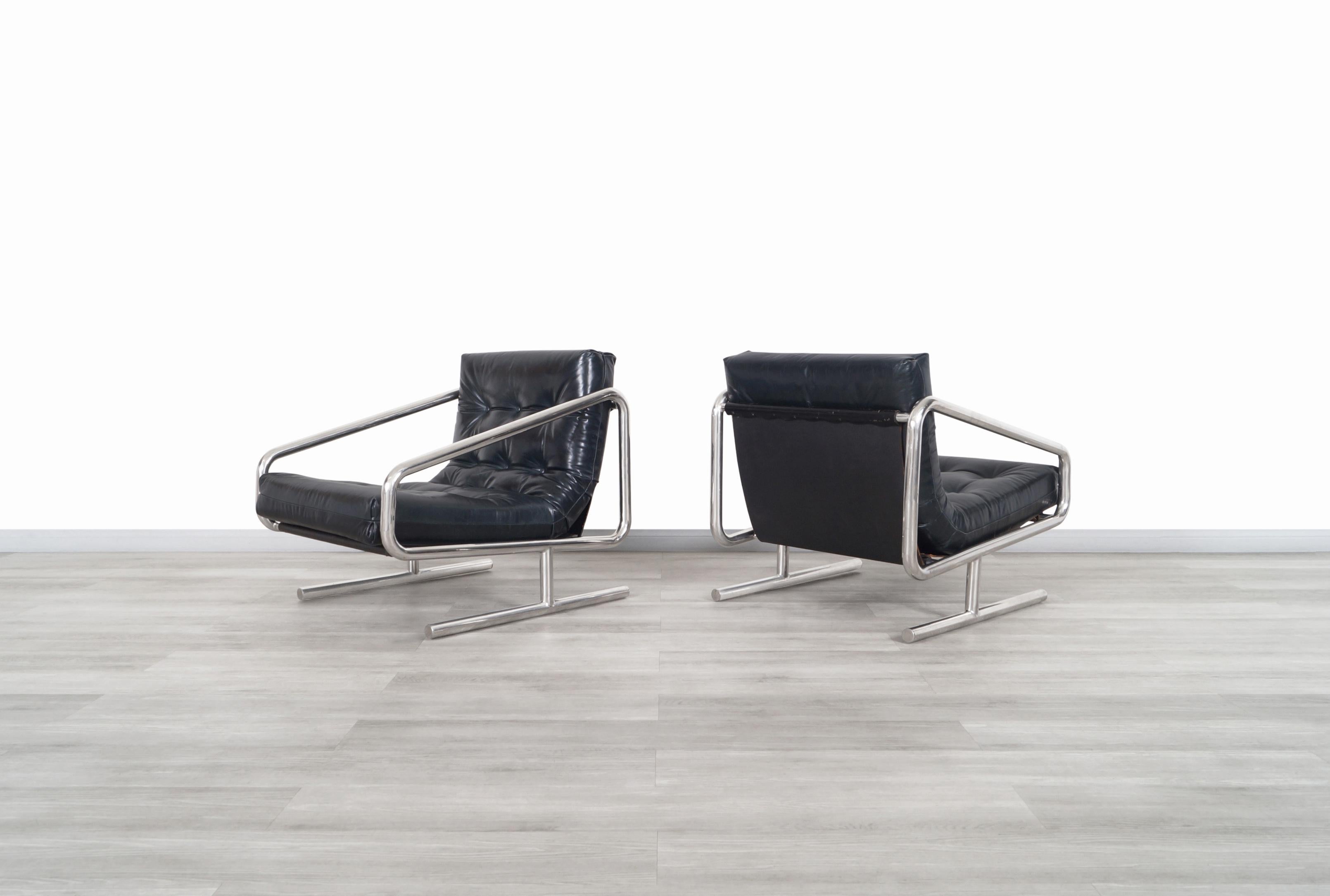 Mid-Century Modern Vintage Leather and Aluminum Lounge Chairs For Sale