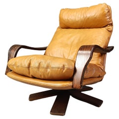 Poltrona vintage in pelle e legno curvato, anni 
70