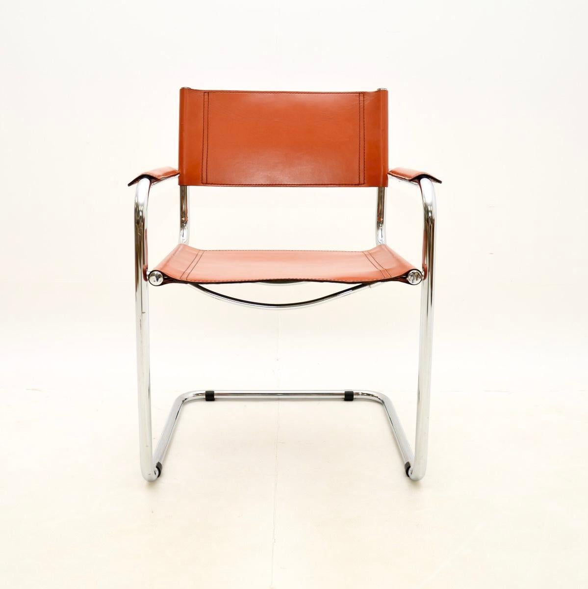 An iconic and stylish vintage leather and chrome chair by Mart Stam. This was originally designed in the 1930’s, this version was made in Italy and dates from around the 1970-80’s.

It is of superb quality, with thick tanned leather upholstery and a