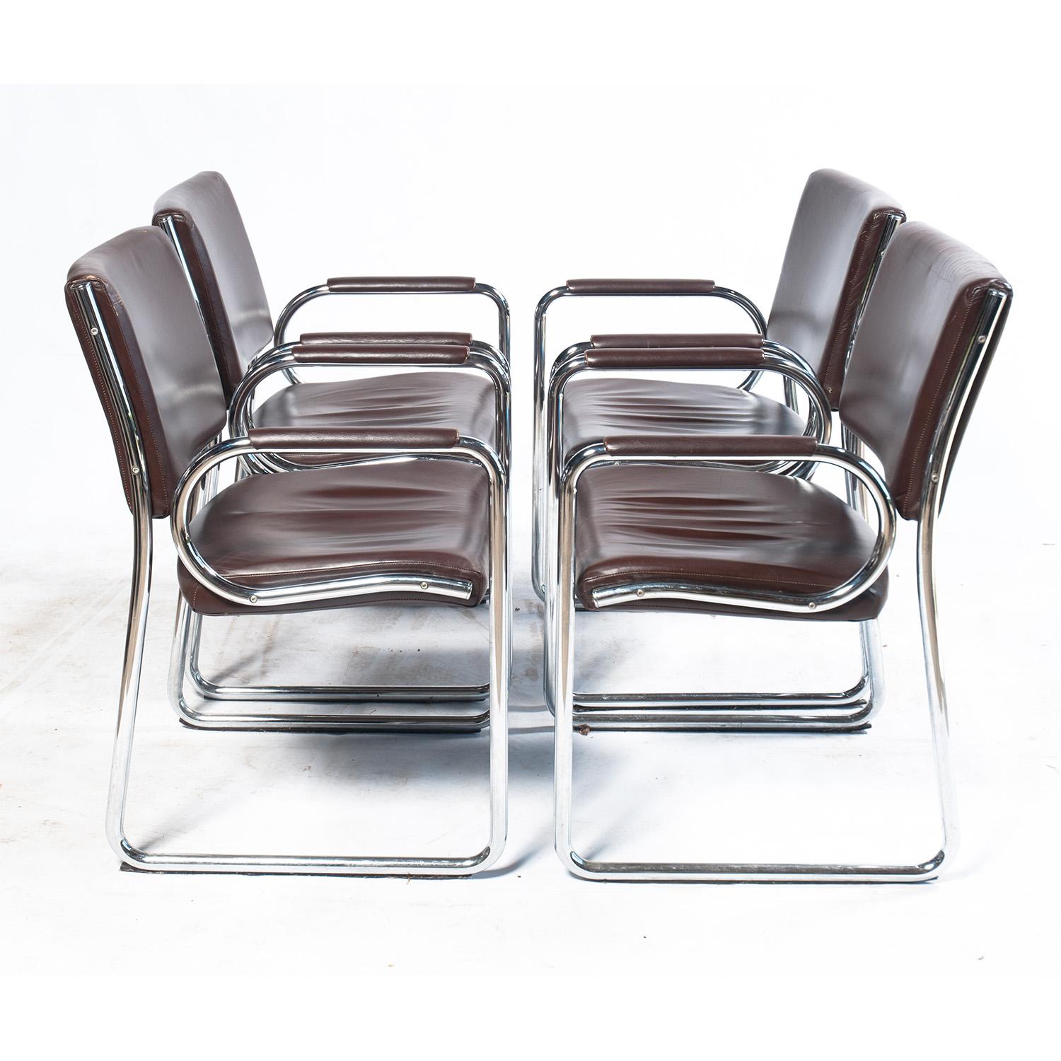 Vintage chocolate brown leather and chrome dining chairs with runner covers for smooth sliding over floors. Very comfortable.

Set of four.