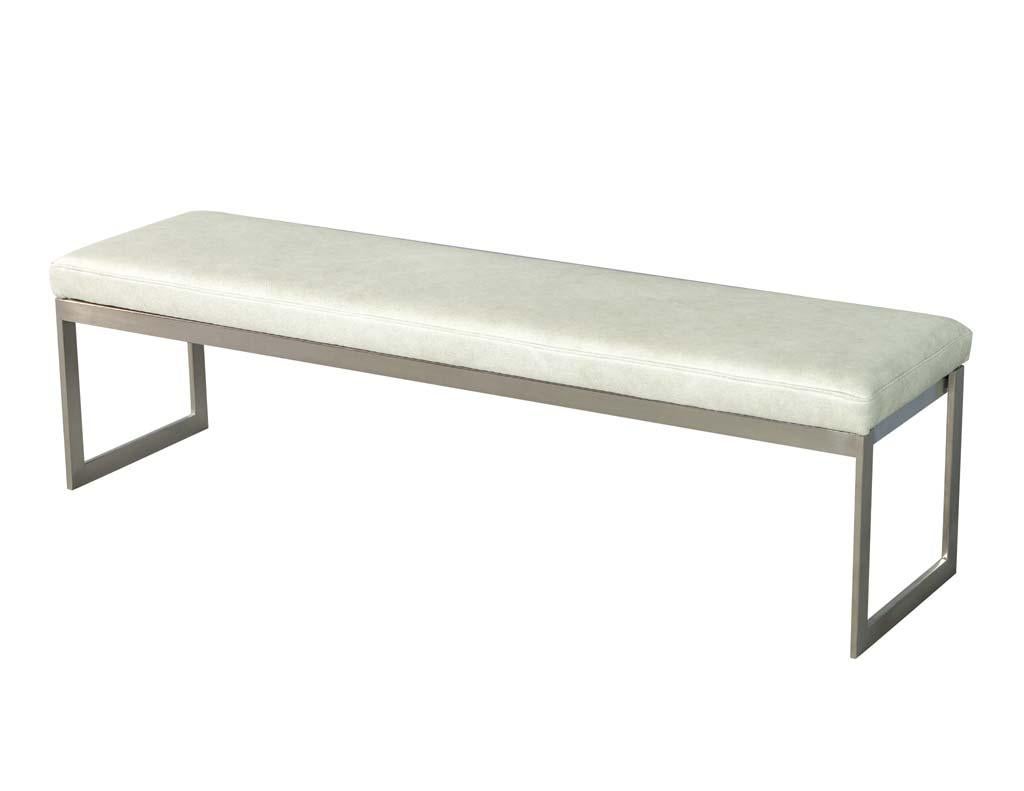 Vintage leather and metal base bench. From the USA, late 20th century re-upholstered in Italian Fabiano Blanco leather. Original metal base with minor wear consistent with age.