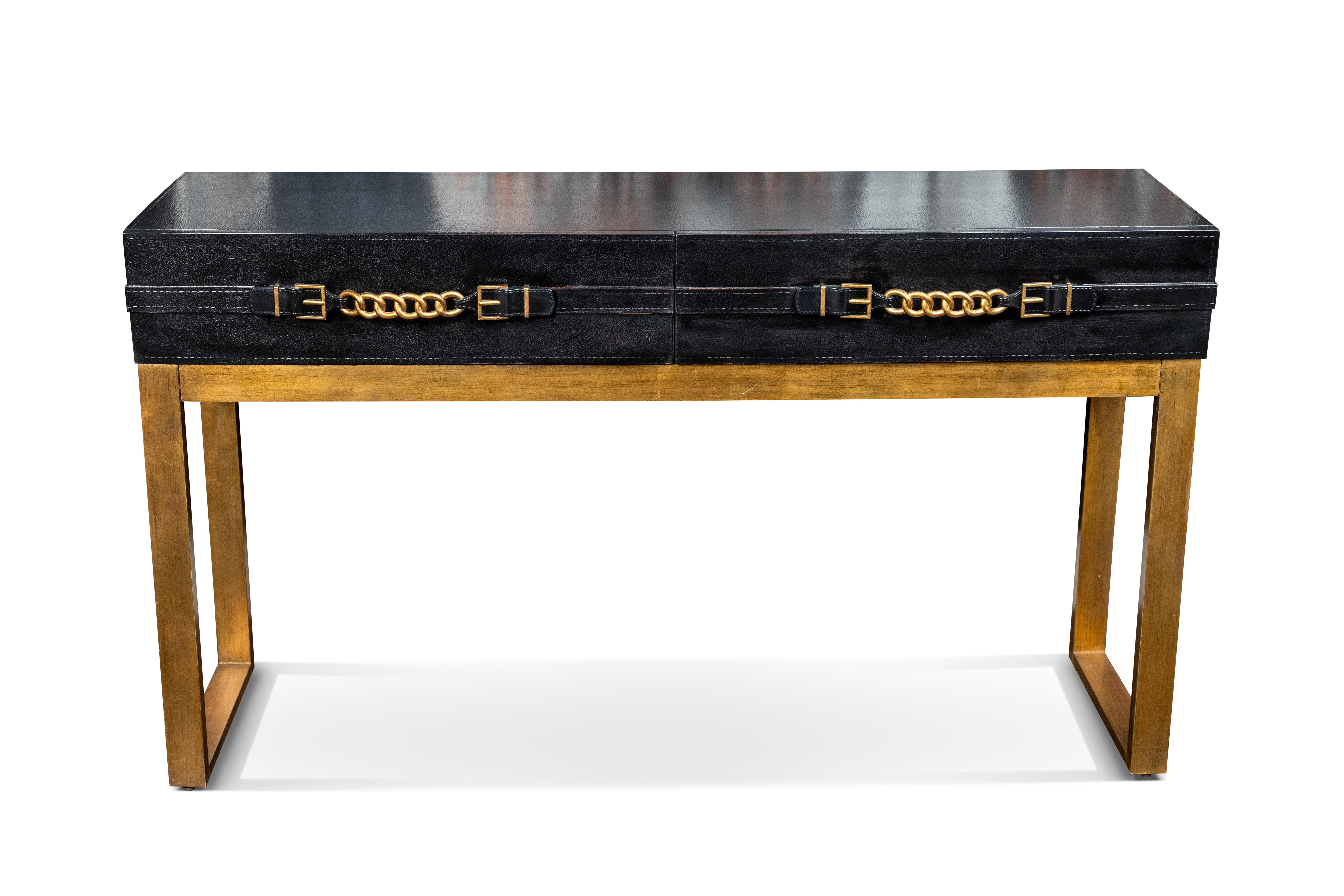 Chic console table with metal base and leather top, adorned with 