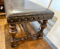 Vintage Leather Ottoman or Bench with carved legs