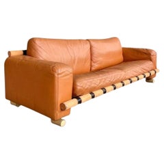 Vintage leather and wood sofa by Carino, circa 1970