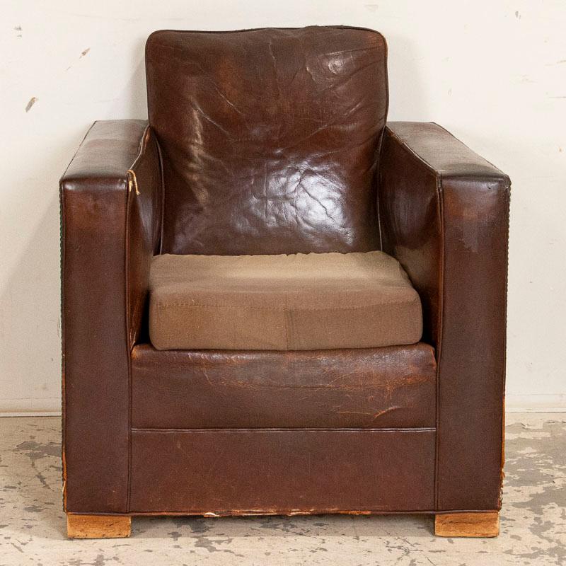 The straight lines of this vintage leather club chair reveal the changing style happening in Denmark in the 1920s. You can literally 