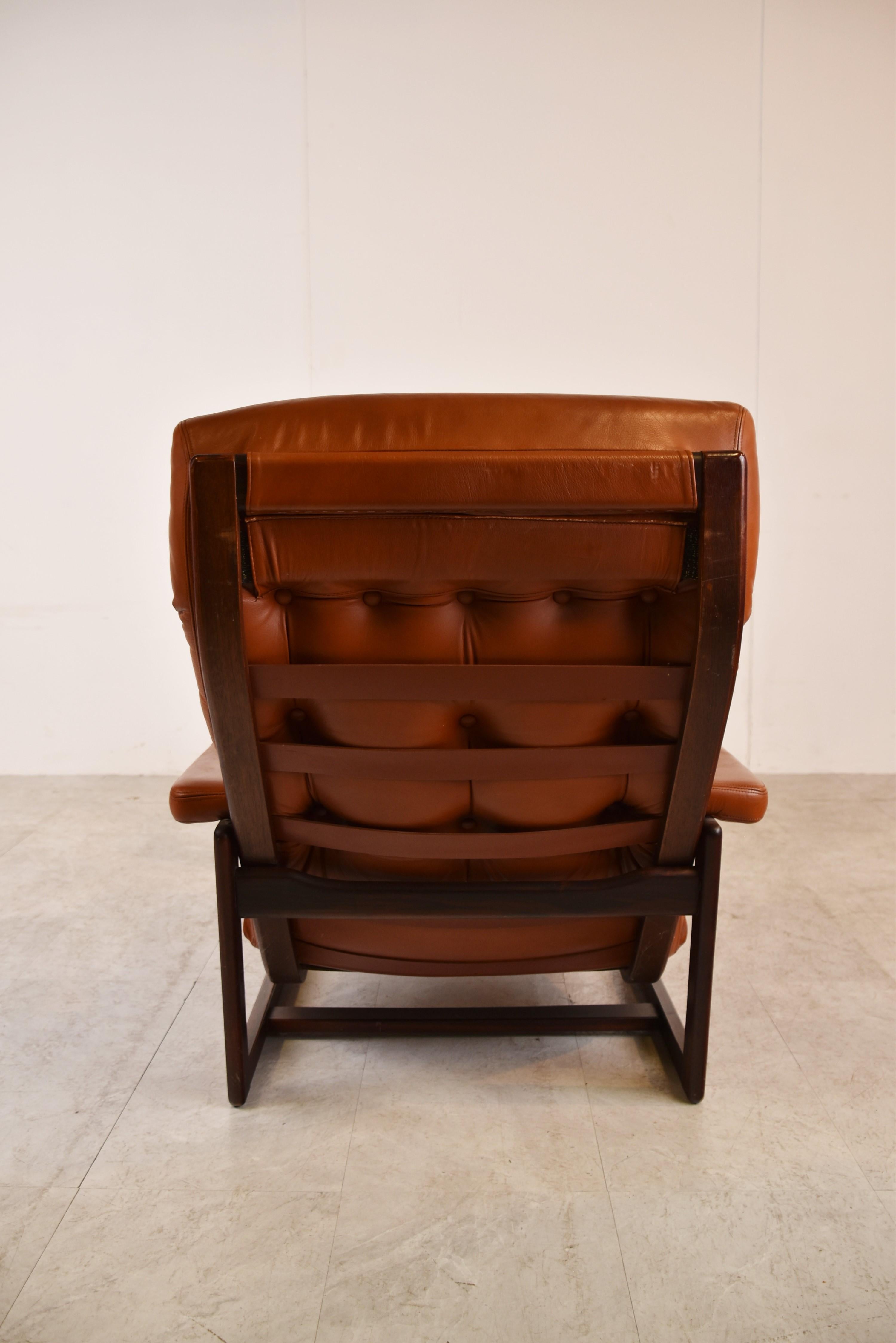 Vintage Leather Armchair with Hocker, 1970s 4