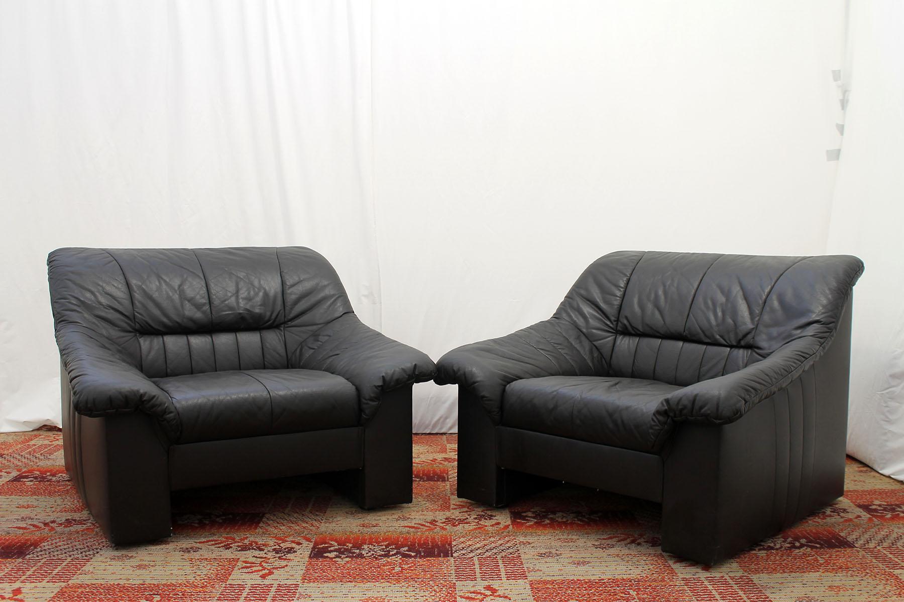These comfortable leather armchairs were made in the 1980s in the former Czechoslovakia.
The chairs are made of black leather.
They are in good vintage condition with no damage.
Price is for the pair.

 Dimensions of the armchairs: 98x75x93 cm