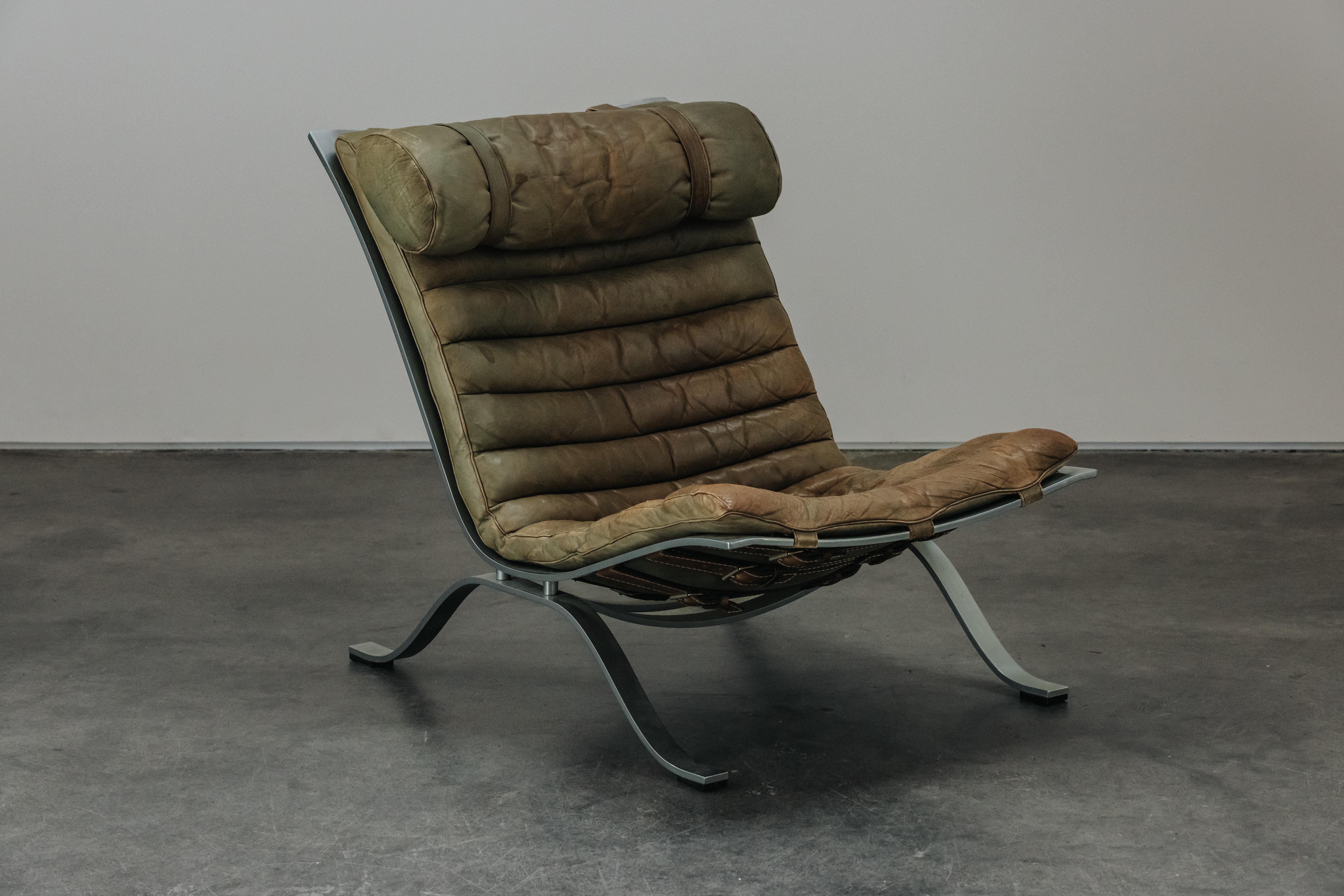 Vintage Leather Arne Norell Ari Lounge Chair From Sweden, Circa 1970.  Original green leather with great patina and use.  Chrome frame.