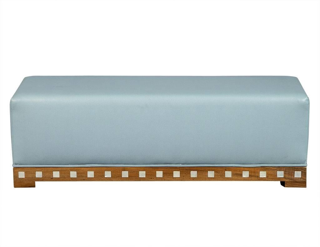 This Art Deco style bench hails from 1970s France. Encased in a beautiful light blue leather, it sits atop a medium brown wood base adorned with square pearly inlays. A perfect fit for a chic home!
Fabric does have some slight signs of wear