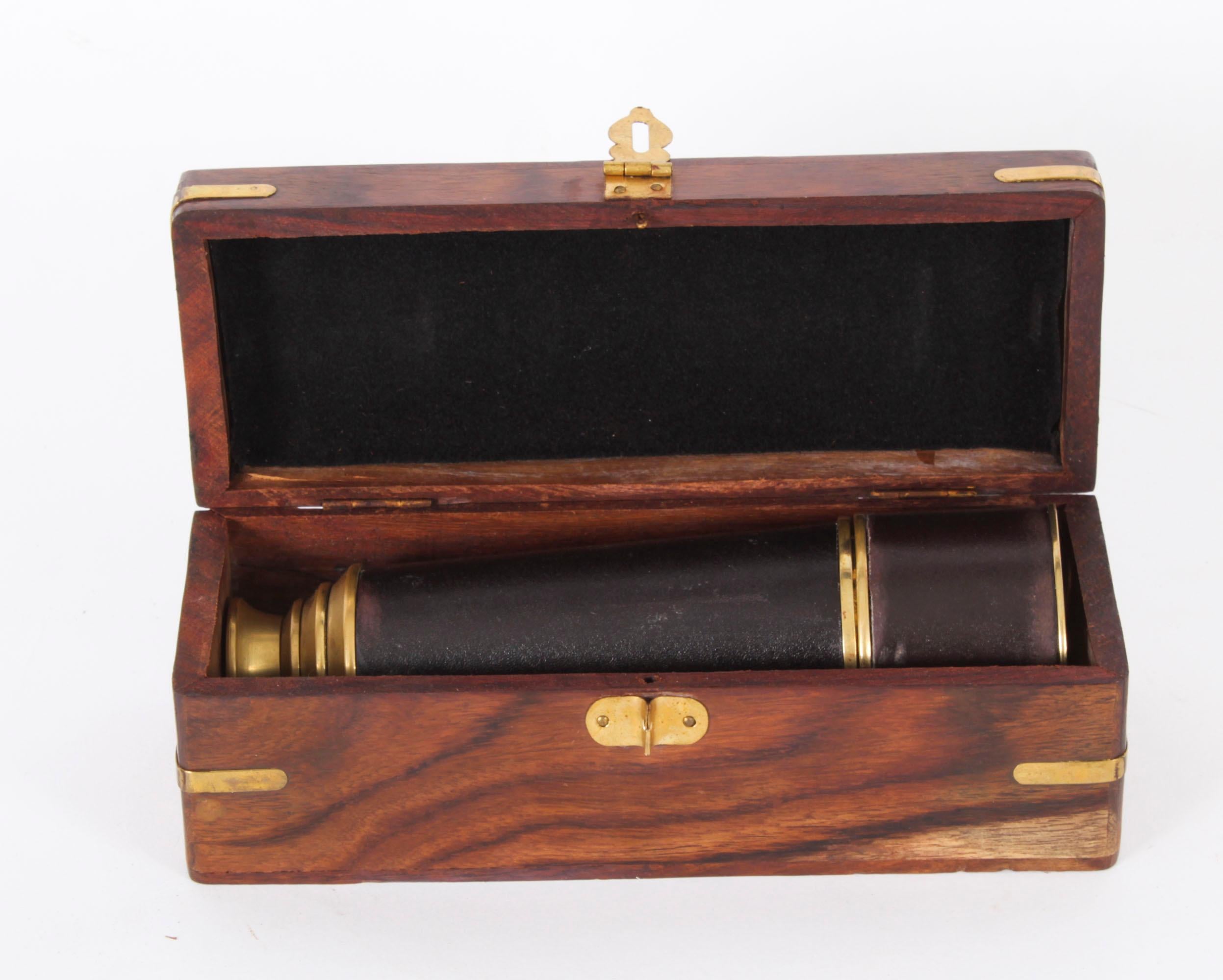A beautiful vintage leather bound brass telescope with the original brass inlaid teak box, late 20th Century in date.
 
The telescope drawers out in four sections and the lenses are clear when looked through.
 
Condition:
In excellent condition and