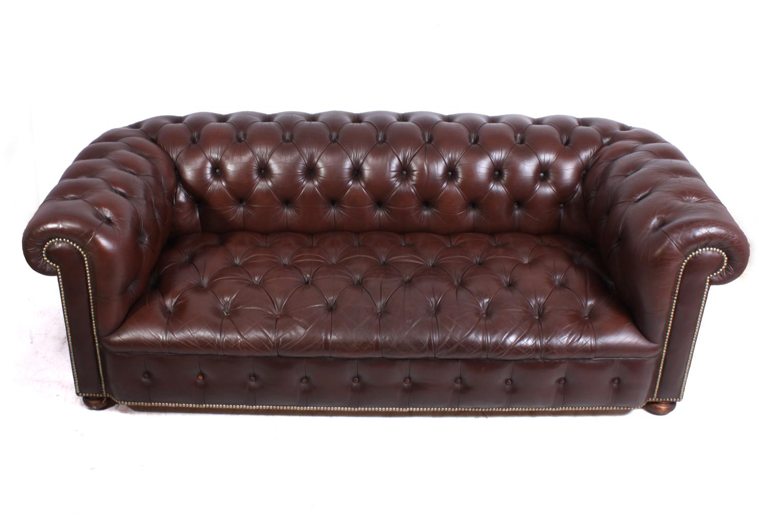 Vintage leather Chesterfield
A good quality brown deep buttoned leather chesterfield sofa, solid hardwood frame coil sprung seat arms and back, bun feet at the front and legs at the back, all buttons present, no rips or tears in the leather

Age