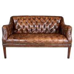 Divano Chesterfield in pelle vintage