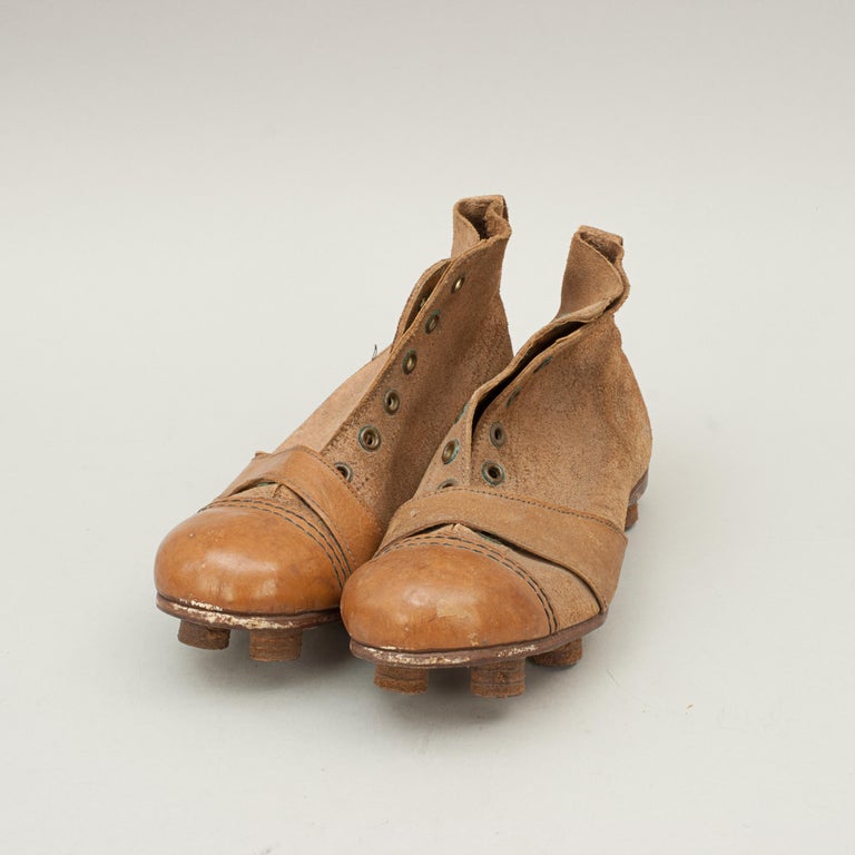 Vintage pair of junior leather football boots.
A rare pair of size 13 unused junior leather football boots. This beautiful pair of leather football boots are in totally unused condition, as new, very rare to find in this condition. Stamped on the