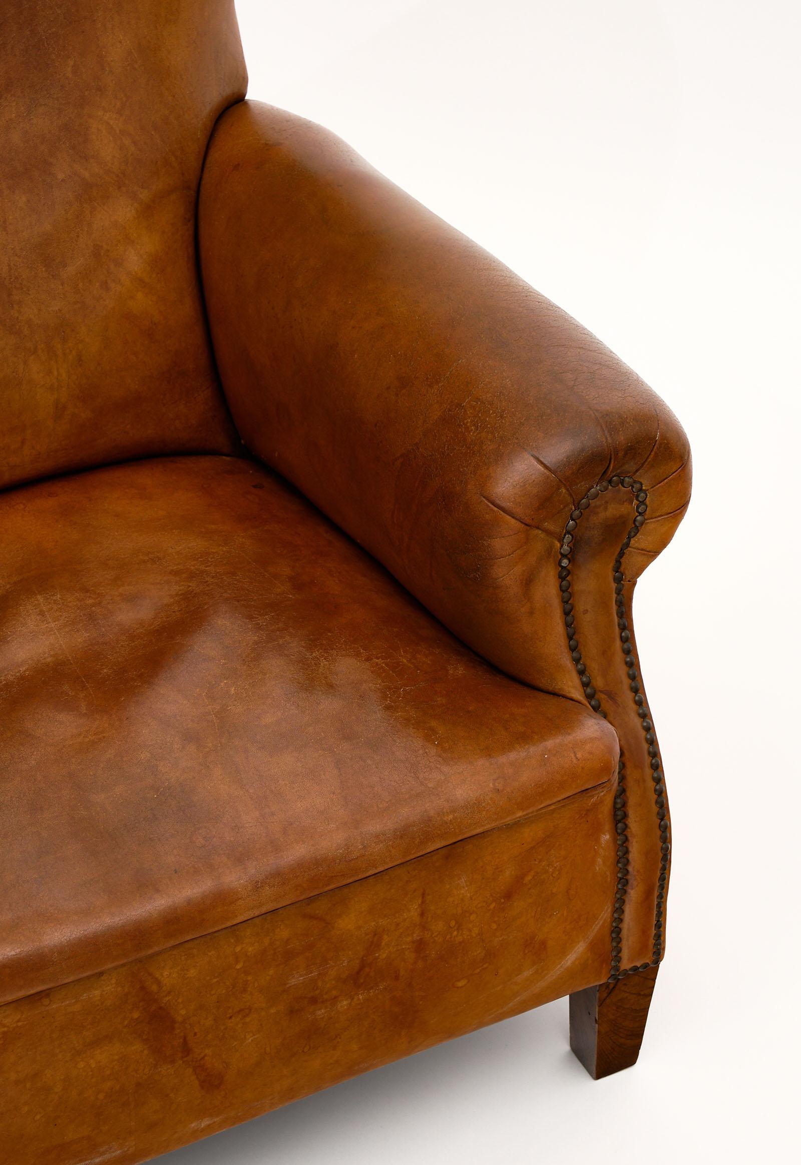 vintage leather chair and ottoman