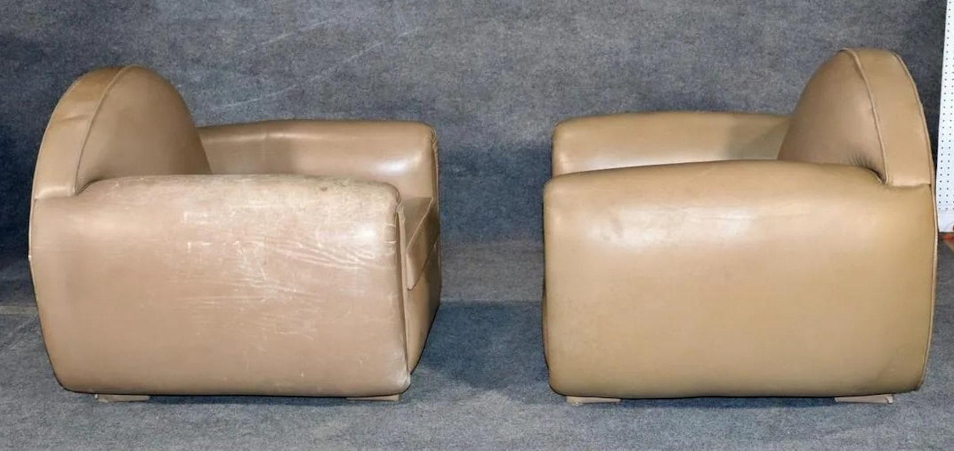 Pair of rounded all leather club chairs. Deco style design with round back, soft leather, attractive age and patina.
Please confirm location NY or NJ.