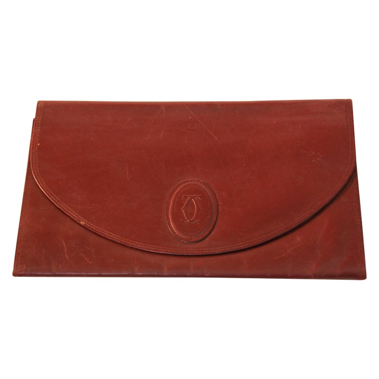 Vintage Leather Clutch Bag "Les Must de Cartier" Burgundy Bordeaux For Sale  at 1stDibs