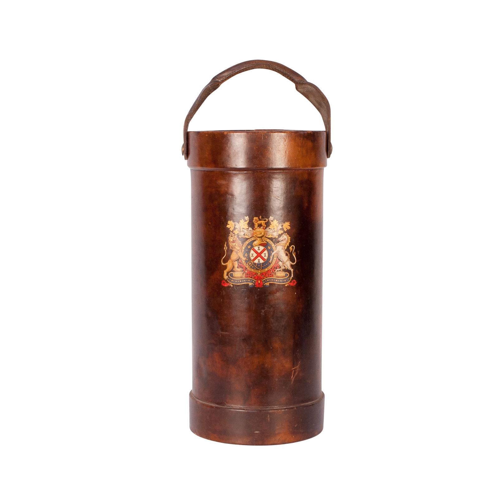 A Vintage English leather document holder with a decorative armorial on leather, circa 1950. This is made in the Georgian English style and is great as an umbrella stand or a dry trash can.