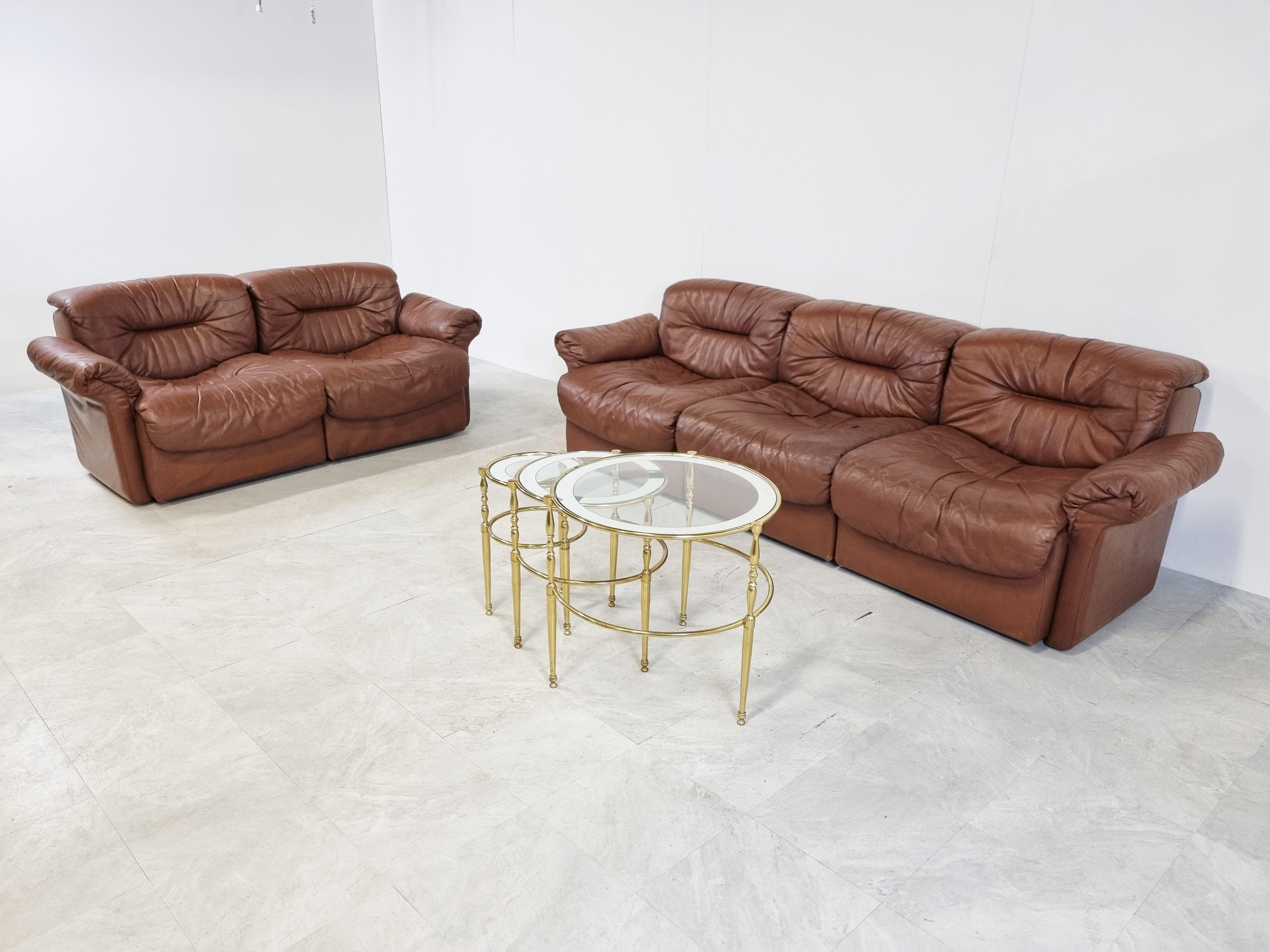 Mid century sofa set in brown leather by Desede model DS14

The set consists of a three seater bench and a two seater bench with armrests.

Nice quality leather, as you would expect from Desede. 

Good original condition, with some lovely