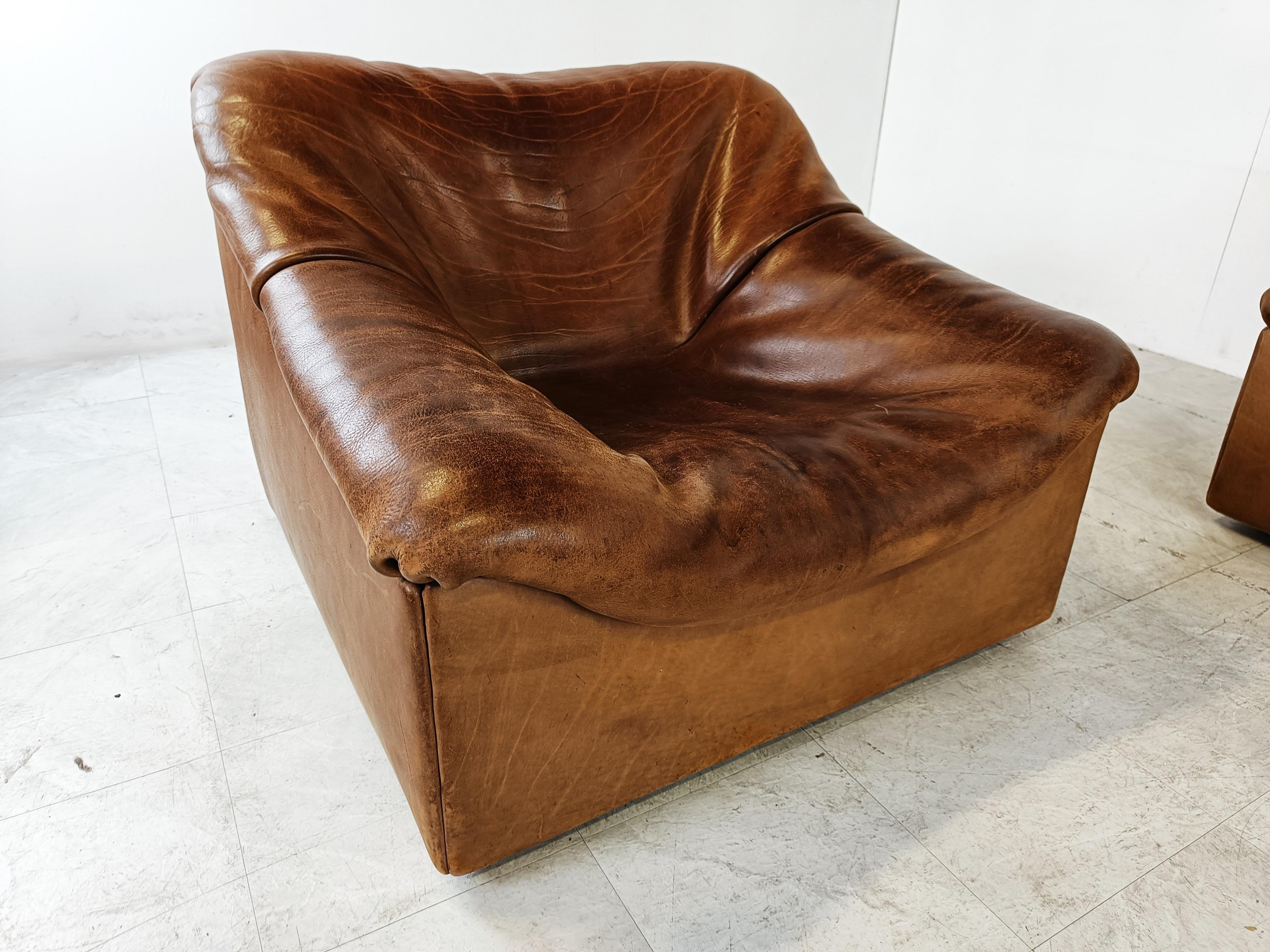 Mid century thick Buffalo neck leather sofas by Desede consisting of 4 elements. 2 elements form a two seater sofa and two other elements are armchairs.

Desede stands for pure quality of leather. 

Especially the DS46 has very thick leather