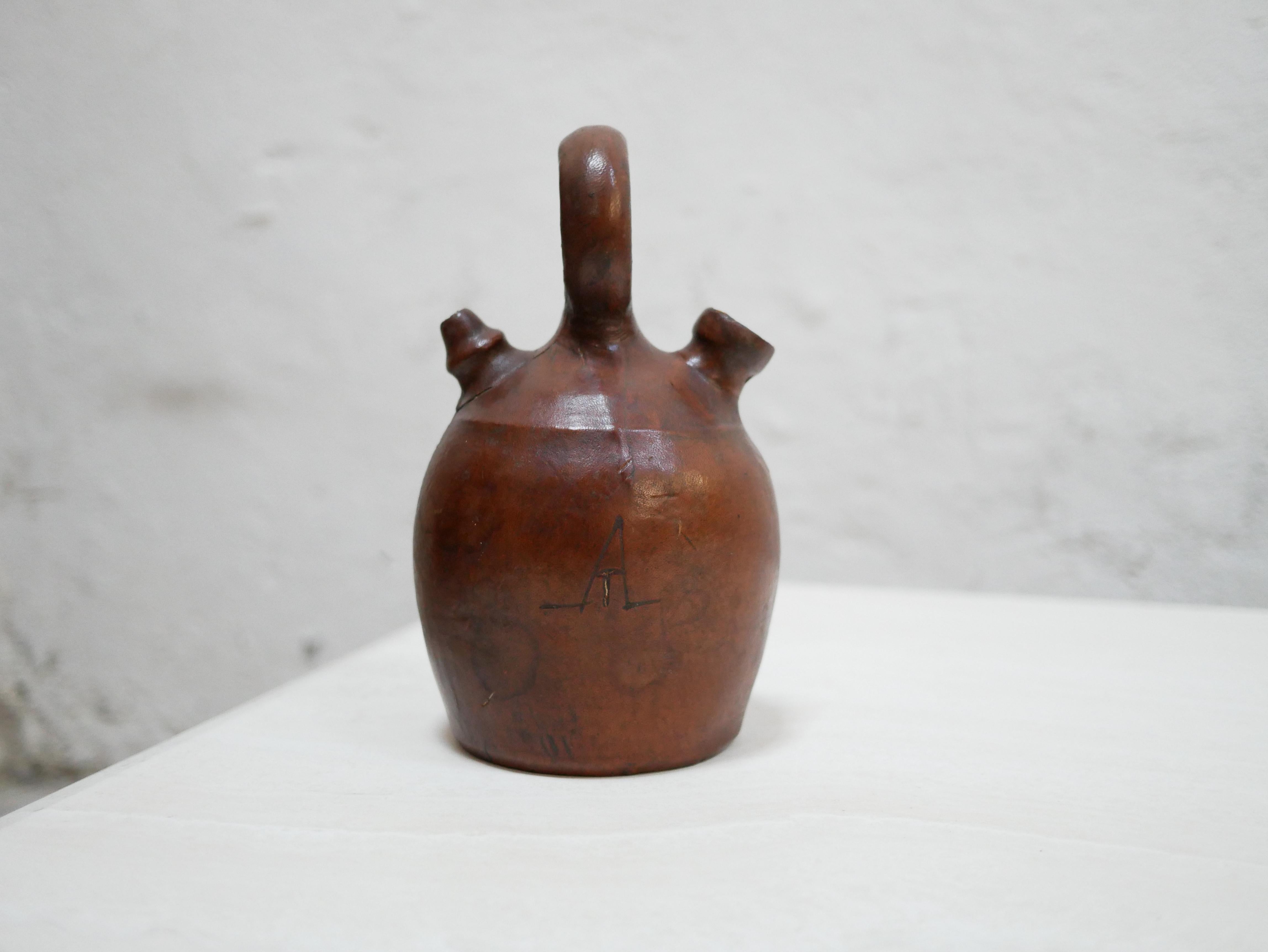 French Vintage leather gargoulette pot For Sale
