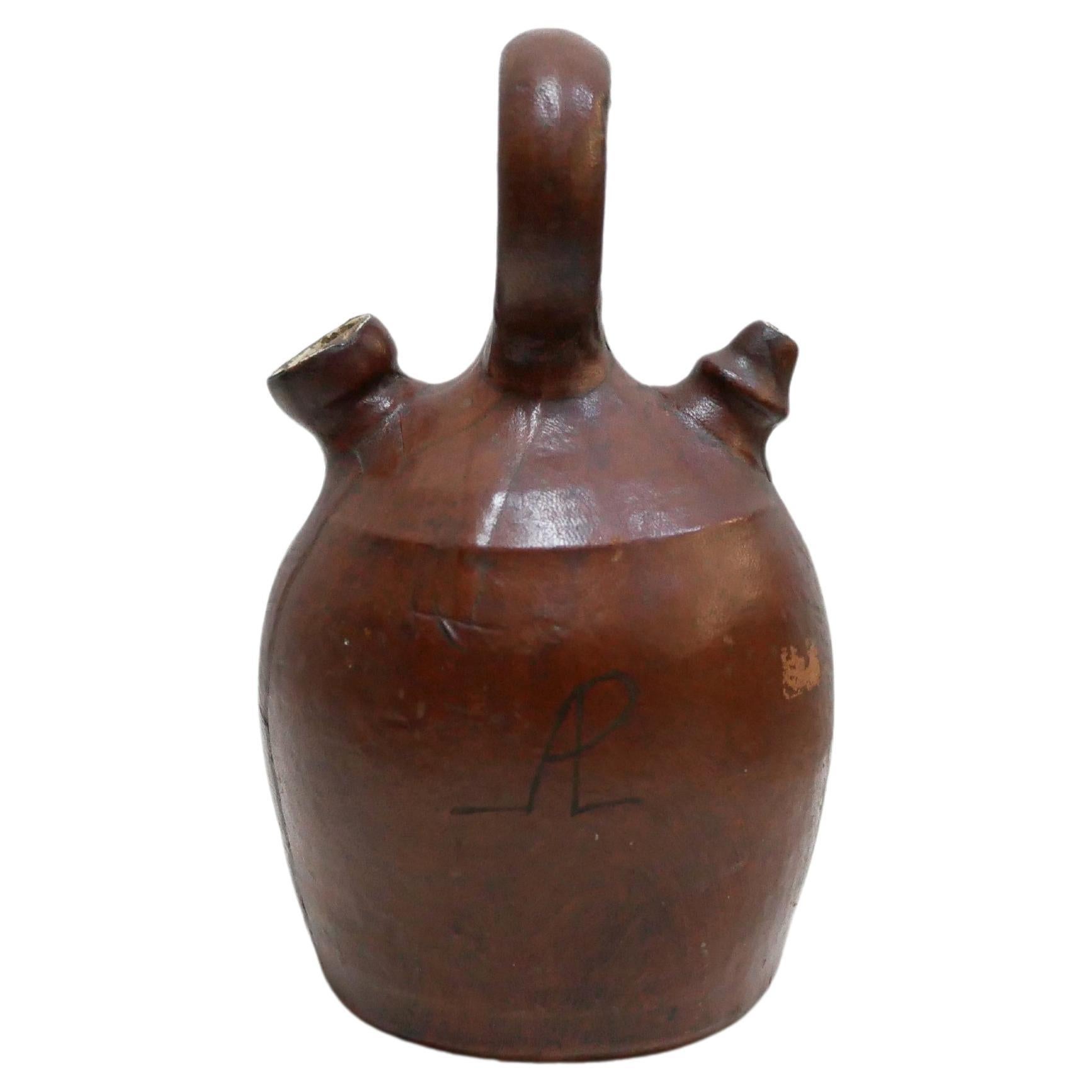 Vintage leather gargoulette pot For Sale