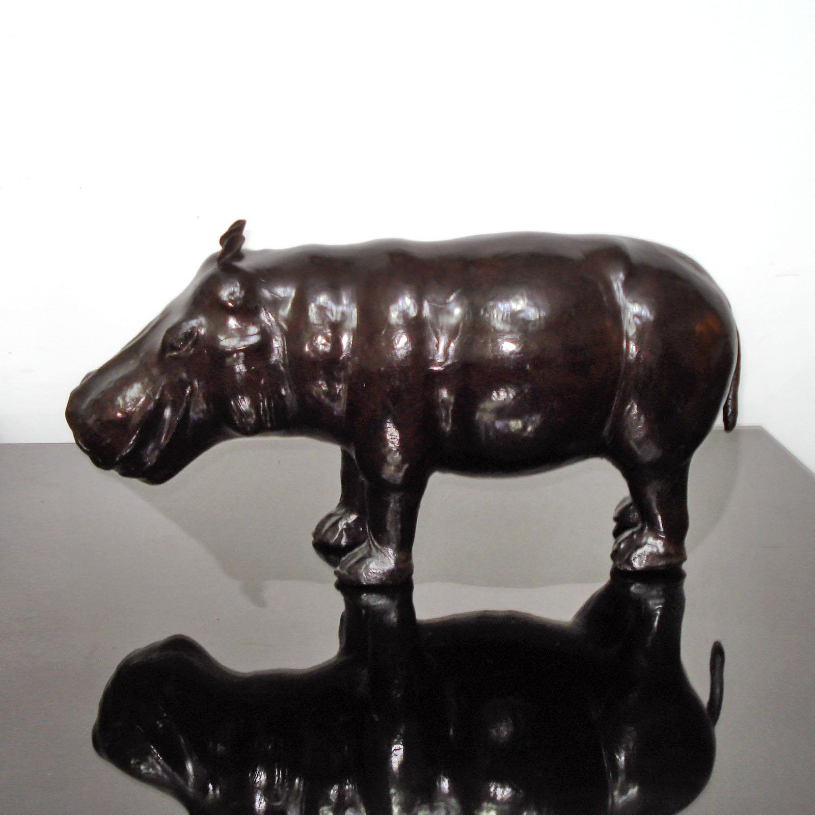 Leather hippo designed by Dimitri Omersa for Abercrombie & Fitch. Retailed by Liberty of London.
In very good used condition.
Dimensions: 45x 1 6 x 23 cm.