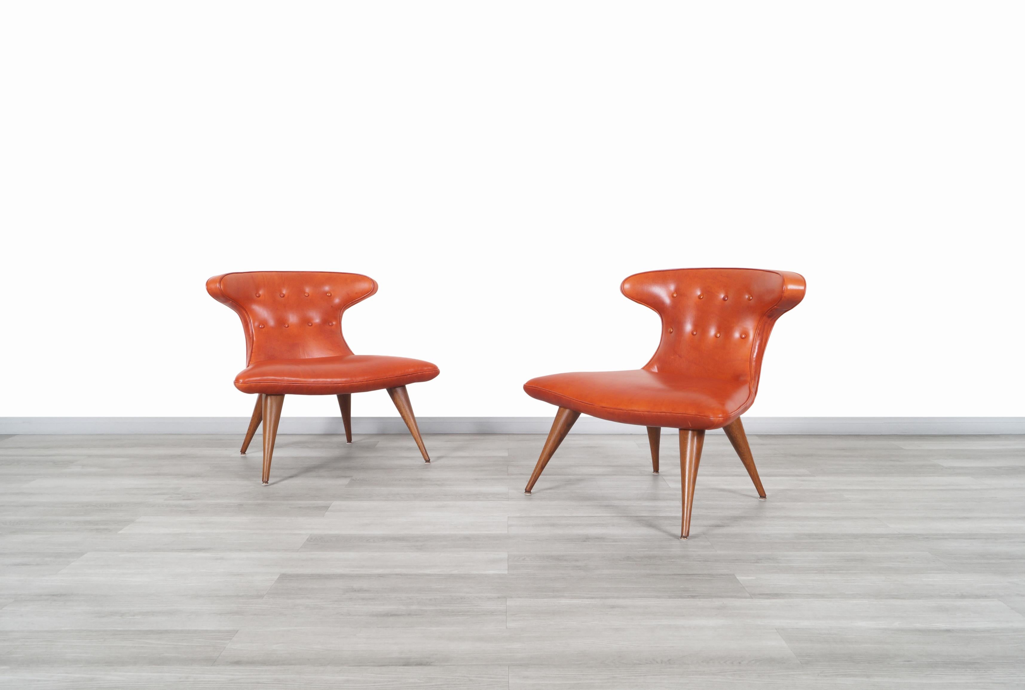 Exceptional vintage leather “Horn” chairs designed in the manner of Karpen of California and manufactured in the United States, circa 1960s. These chairs have an innovative design that stands out for its rounded edges. Each chair has been