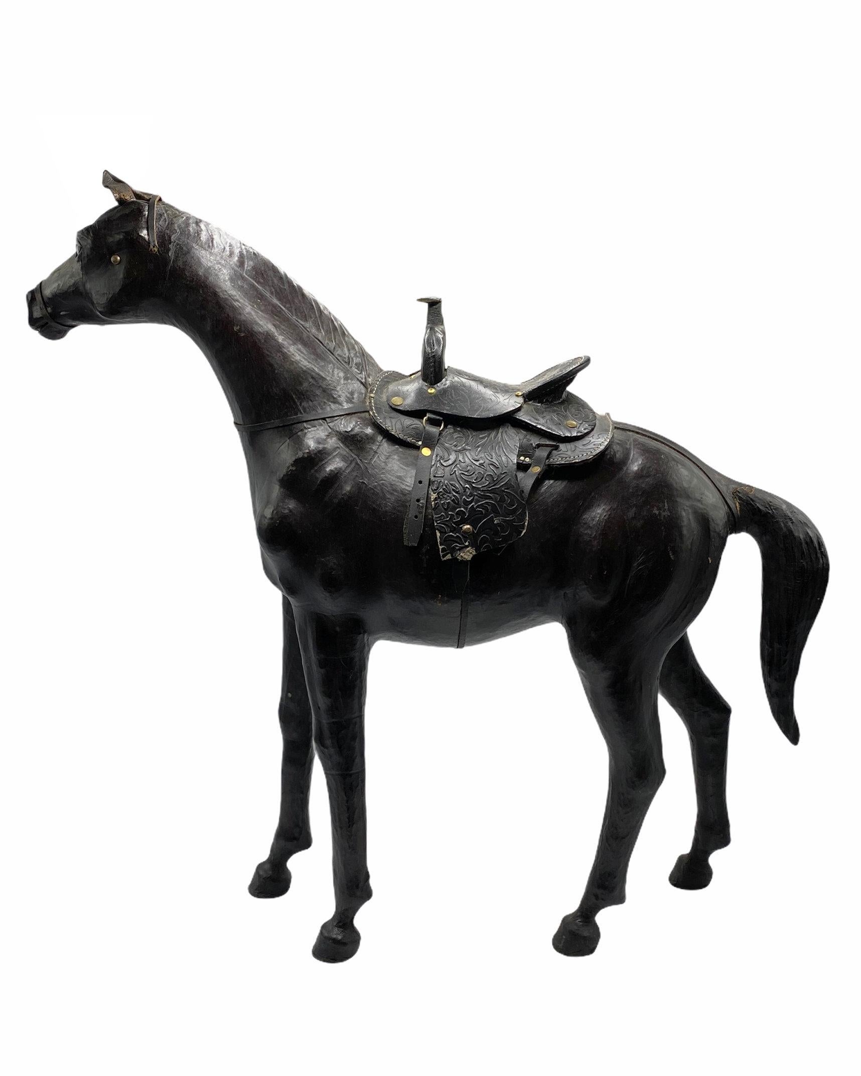 Vintage leather horse figurine embossed with very fine details.