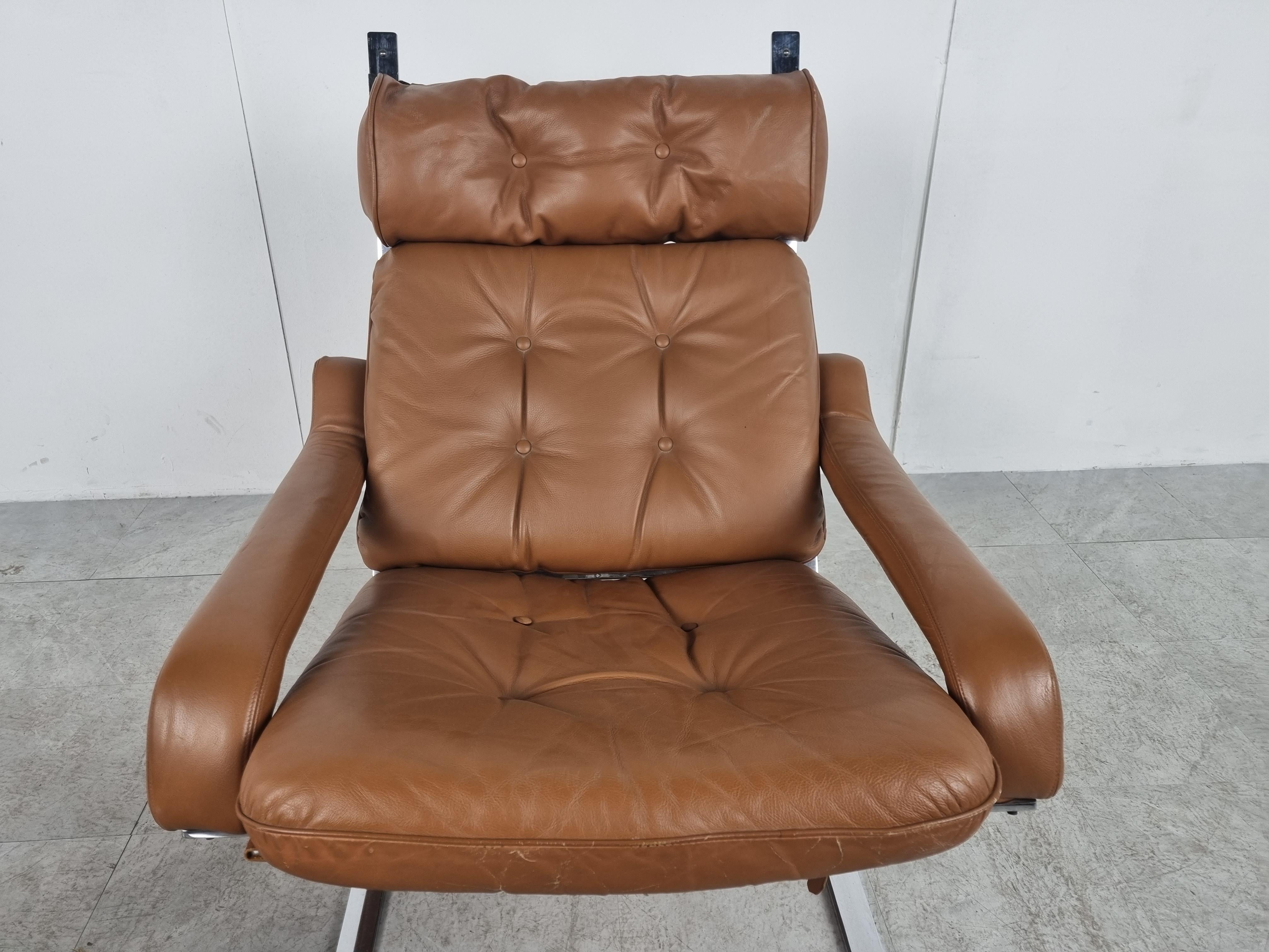 Vintage leather lounge chair with ottoman by Reinhold Adolf, 1970s 2