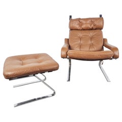 Vintage leather lounge chair with ottoman by Reinhold Adolf, 1970s