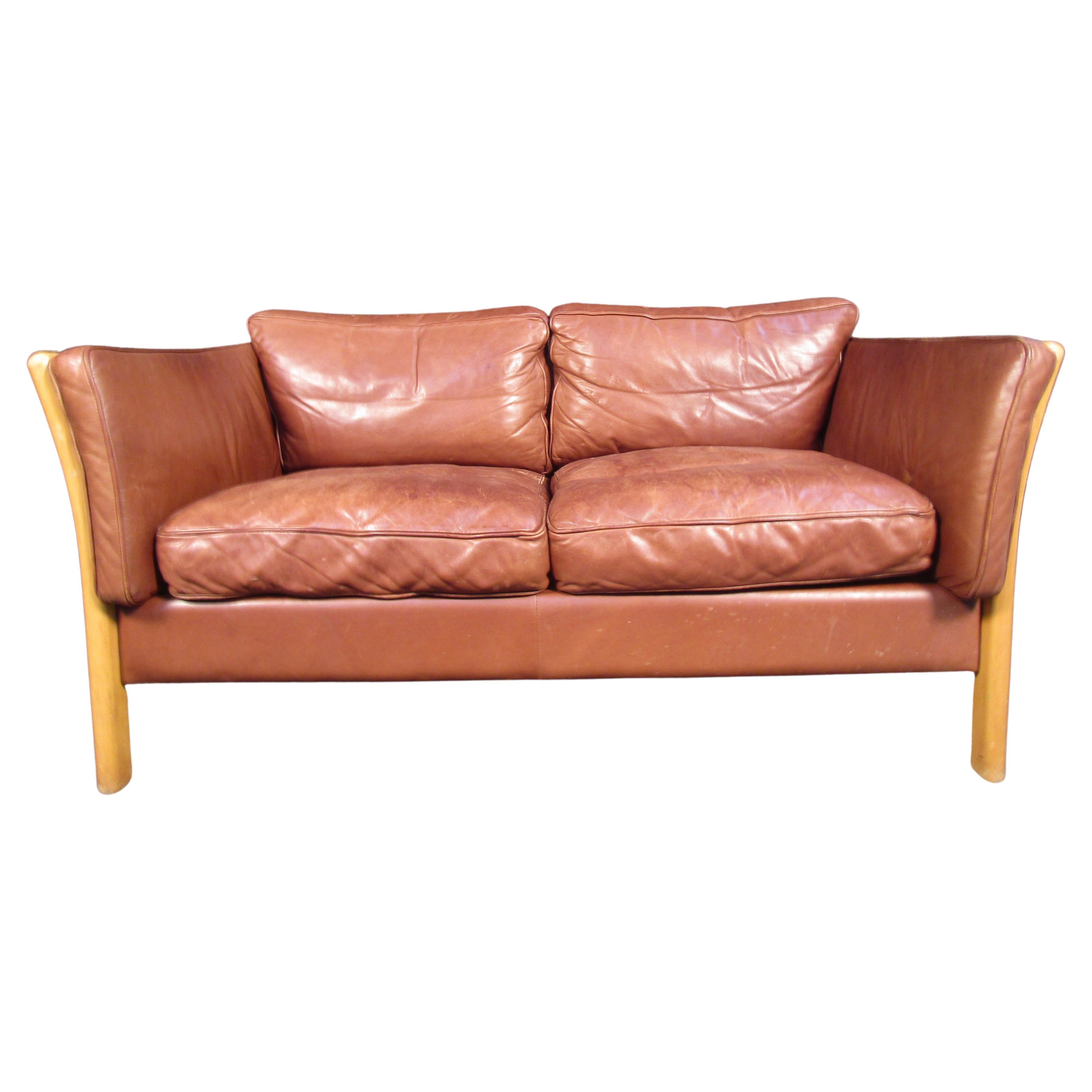 Loveseat en cuir vintage en vente