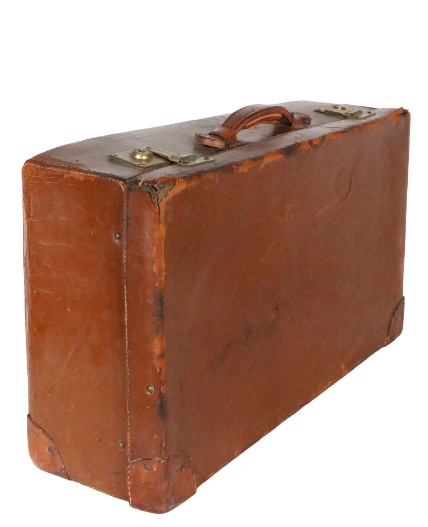 20th Century Vintage Leather Luggage Suitcase by Crouch & Fitzgerald, circa 1900s/ 1940s