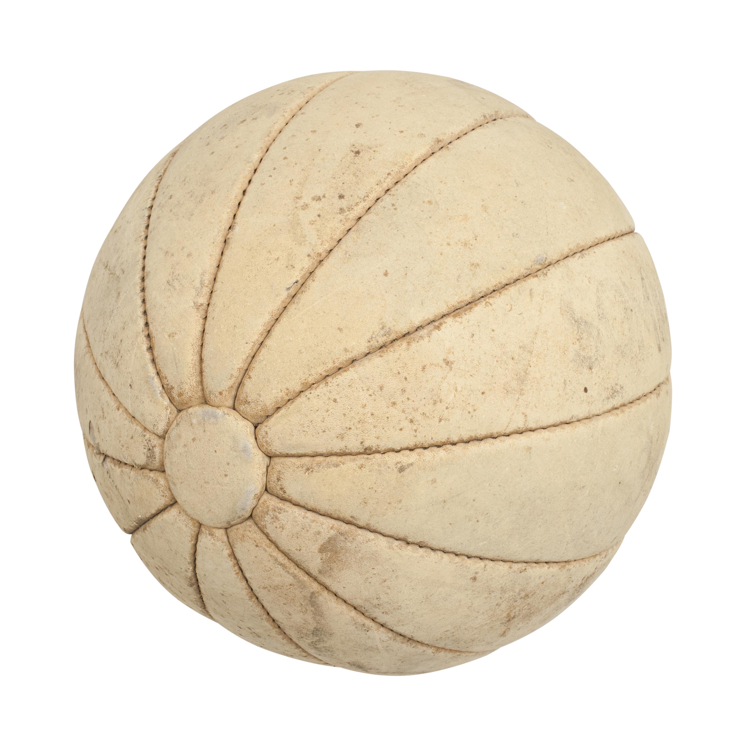 A good quality suede leather medicine ball (pumpkin shaped). The is made from twelve leather segments sewn around two leather discs (one at each end). One of the segments has a faint name on it 'SOMMS'. These types of balls have been widely used for