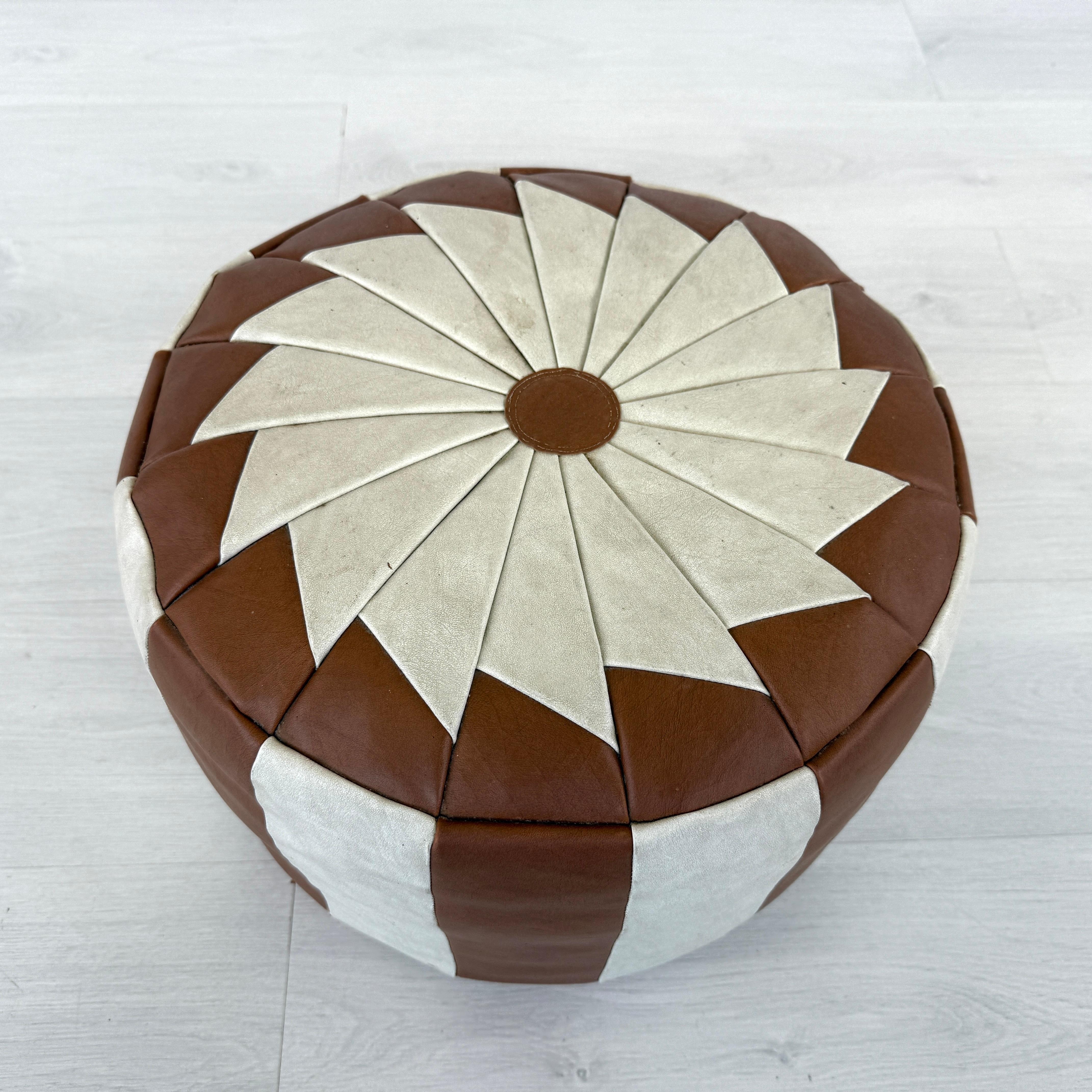 Dimensions: H 11.5” x W 15.5”

Vintage handcrafted two tone leather pouf ottoman. Great decorative piece in wonderful vintage condition. 

Please see our other listings for ideas and matching pieces.

Condition: Condition consistent with age and