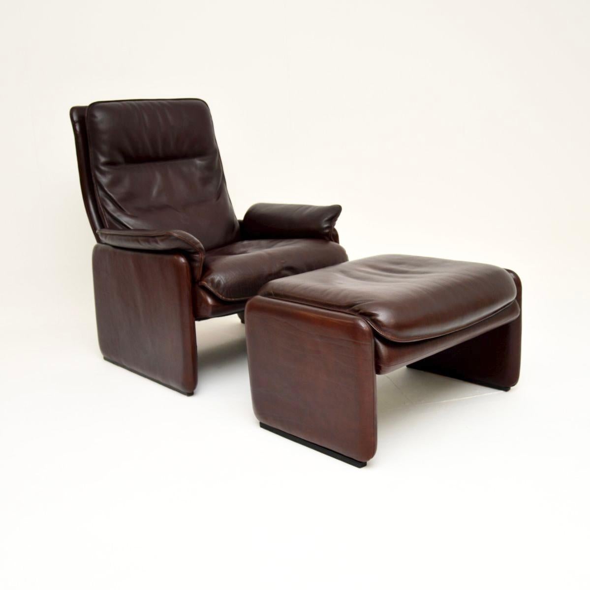 A stylish and incredibly comfortable vintage leather reclining armchair and stool by De Sede. They were made in Switzerland, and date from around the 1960-70’s.

The quality is absolutely superb, as with all De Sede products it is made from the