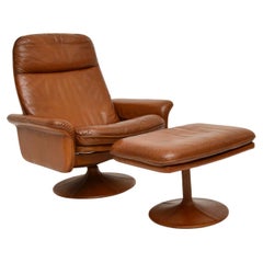 Vintage Leather Reclining Armchair and Stool by De Sede