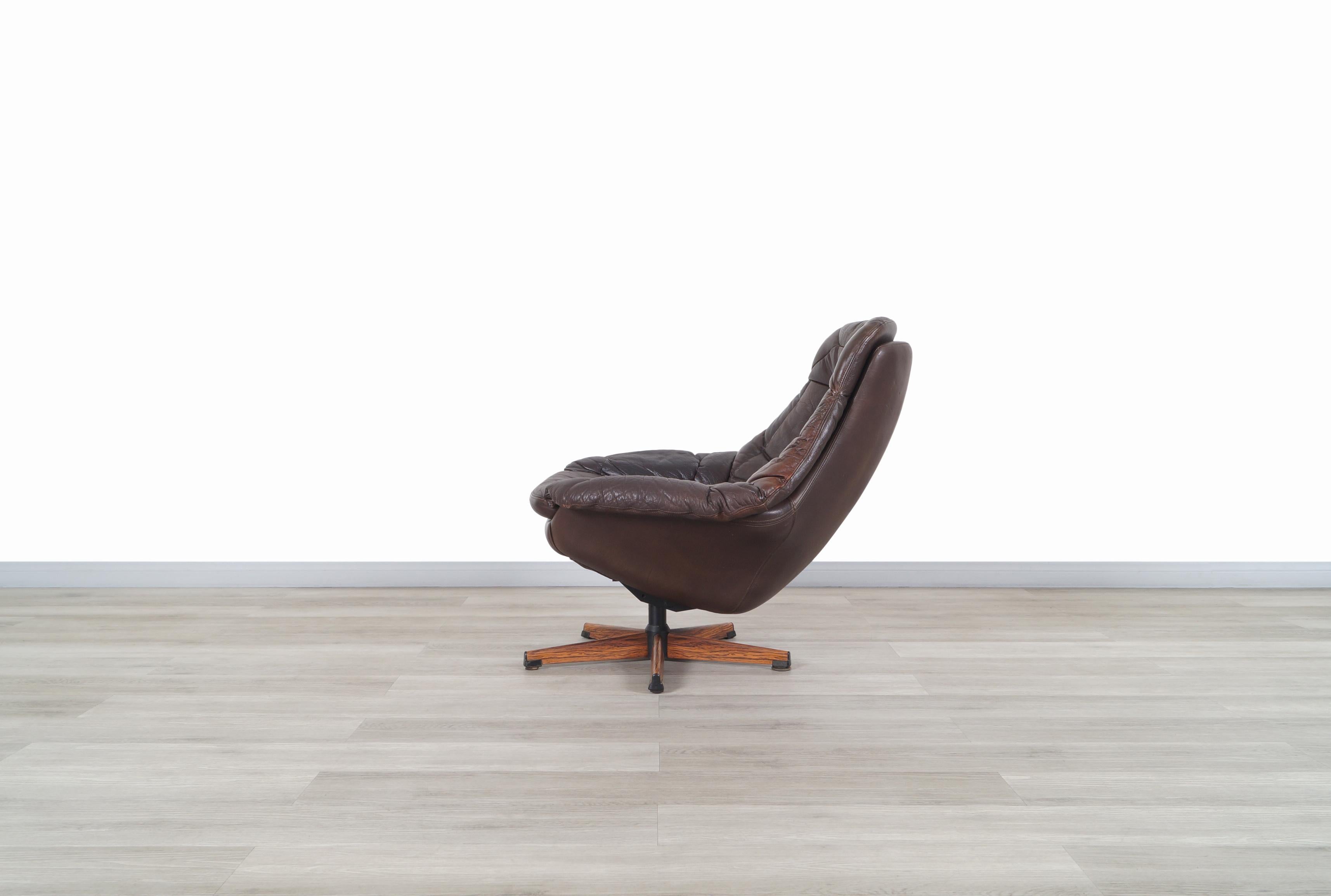 Vintage Leather Reclining Swivel Lounge Chair by H.W. Klein for Bramin 3