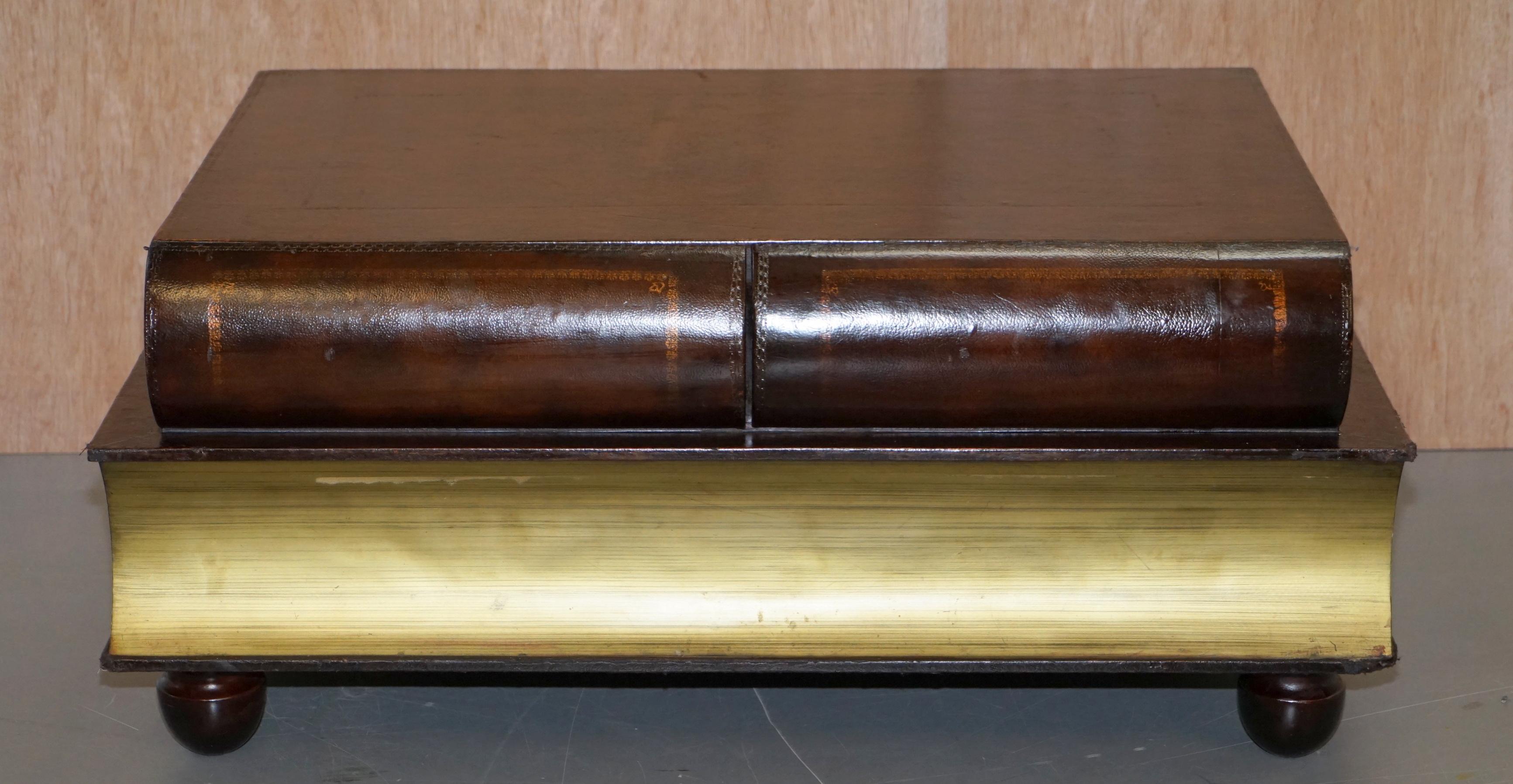 We are delighted to offer for sale this vintage stacked scholars books with twin drawers coffee table

A popular piece of furniture, around 30 years old now and still looks great and very decorative. This is a well used coffee table with a lot of