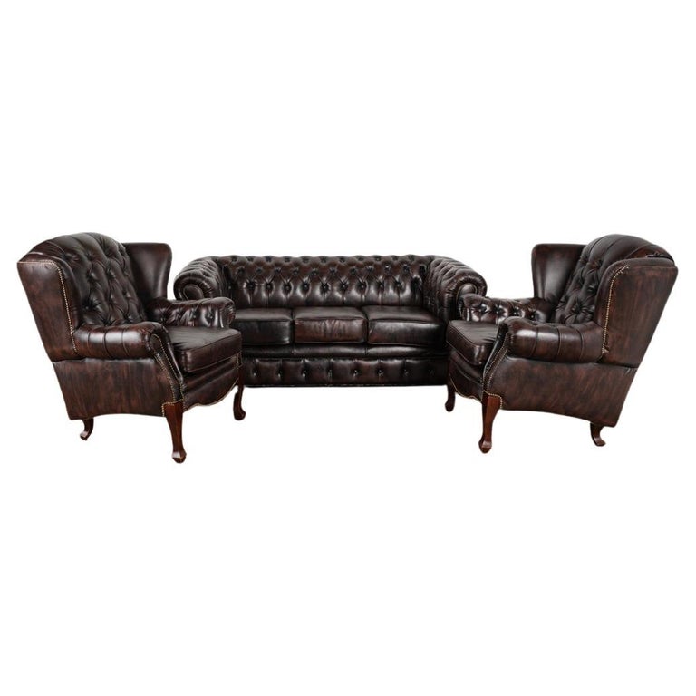 Vintage Leather Set of Chesterfield Sofa and Pair of Wingback Arm Chairs,  Denmar For Sale at 1stDibs