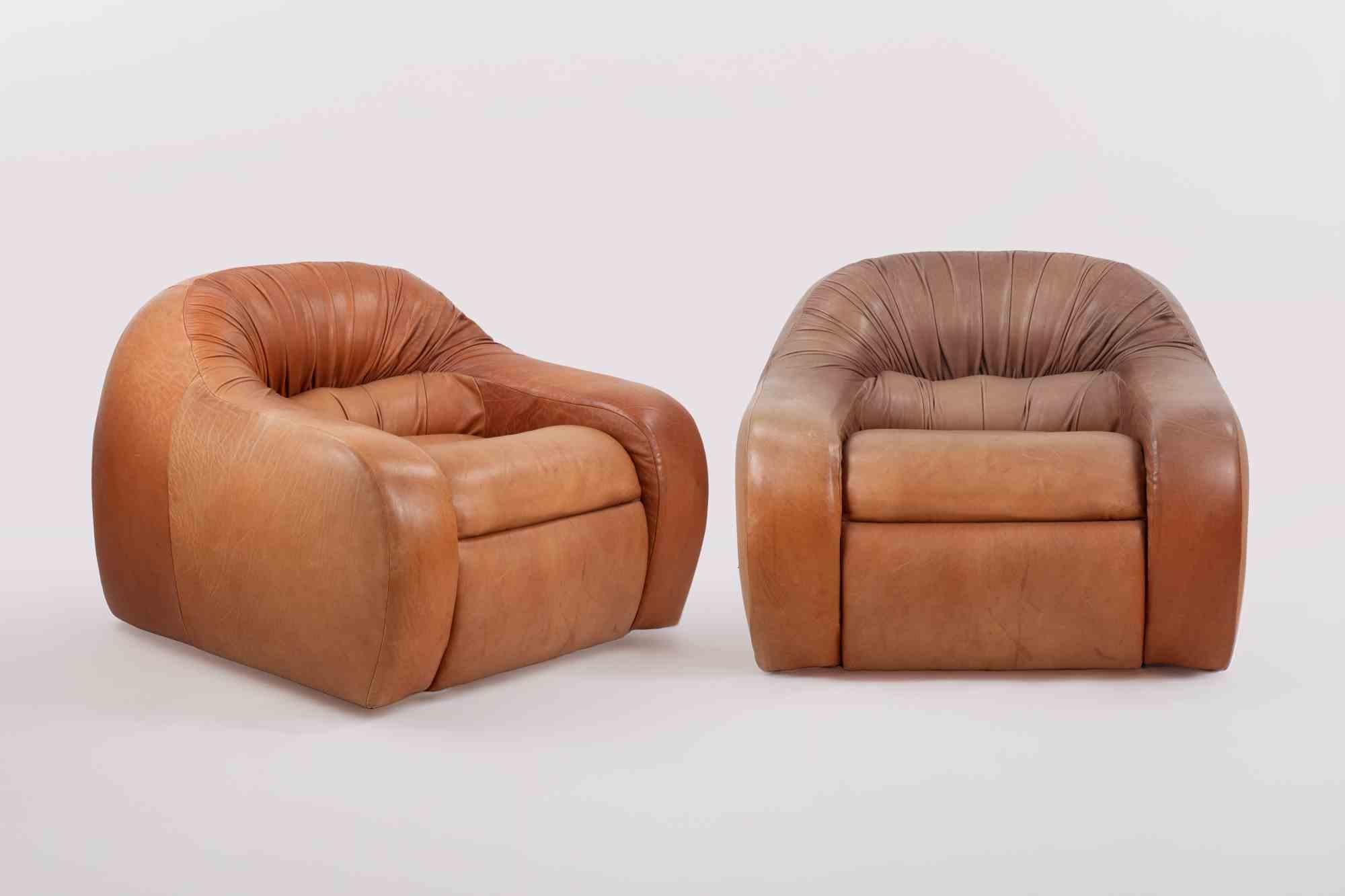 Vintage Leather Sofa Set in the style of Giuseppe Munari.

Original aniline leather, in very good condition.

Sofa: 70x195x90; Armchairs 70x100x90.