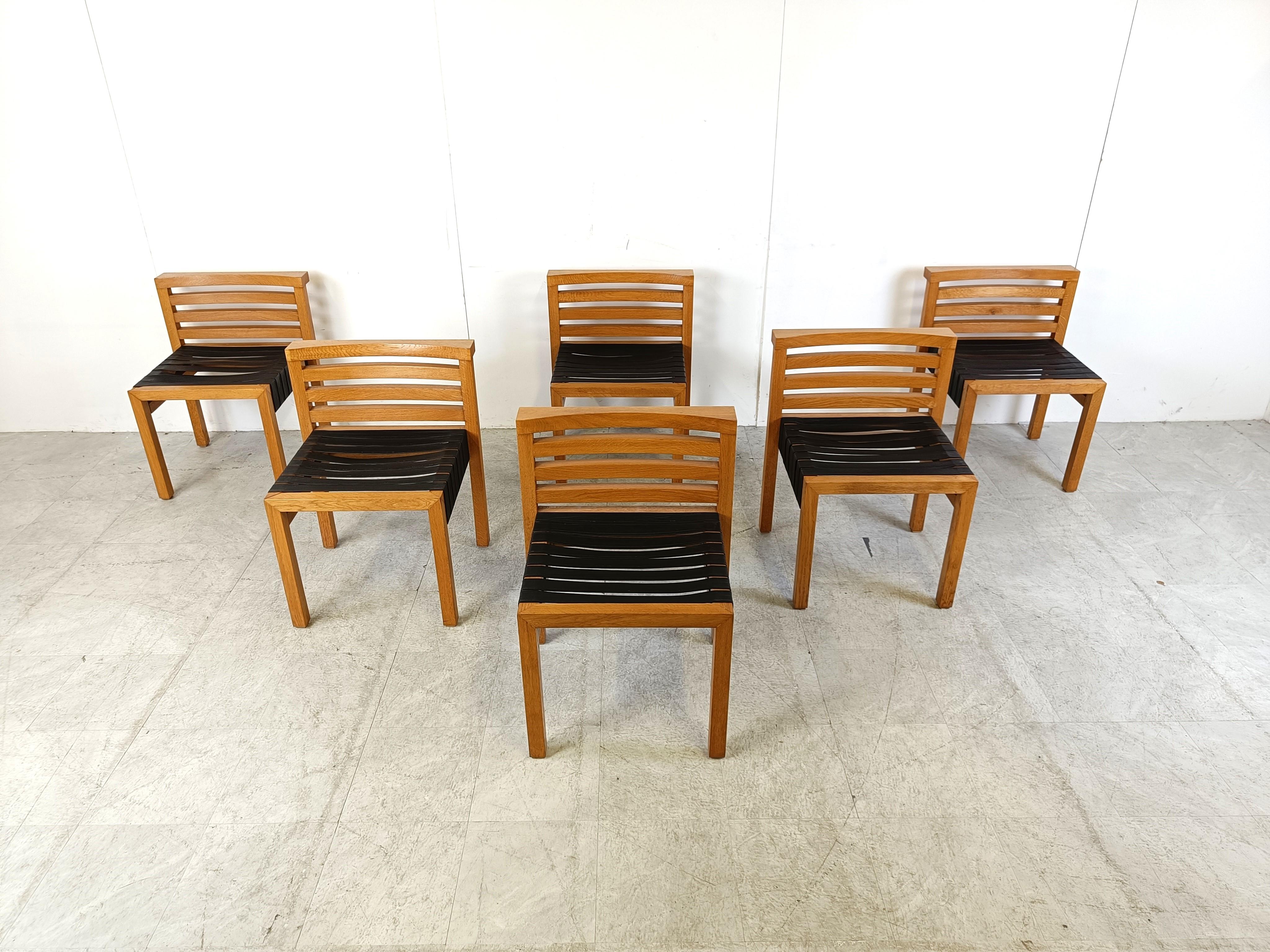 Set of very rare and unique wooden dining chairs with black leather straps as seats.

High quality and well made wooden frames.

Designer unknown

Very good condition.

1970s - Belgium

Dimensions:
Height: 75cm/29.52